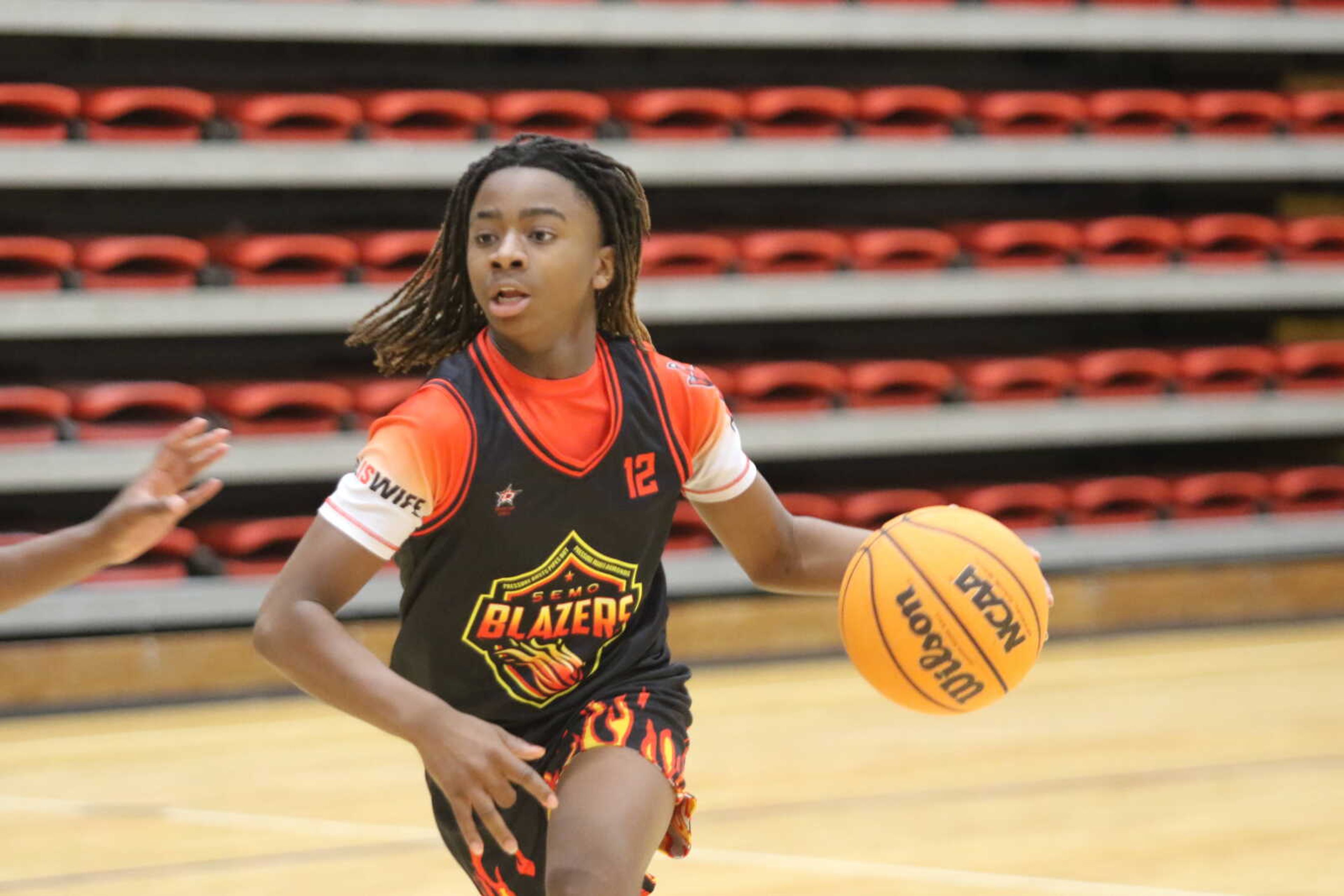 Tristain Johnson of the Semo Blazers explodes to the basket during the 2024 Juneteenth three-on-three basketball tournament on Friday at the Black River Coliseum.
