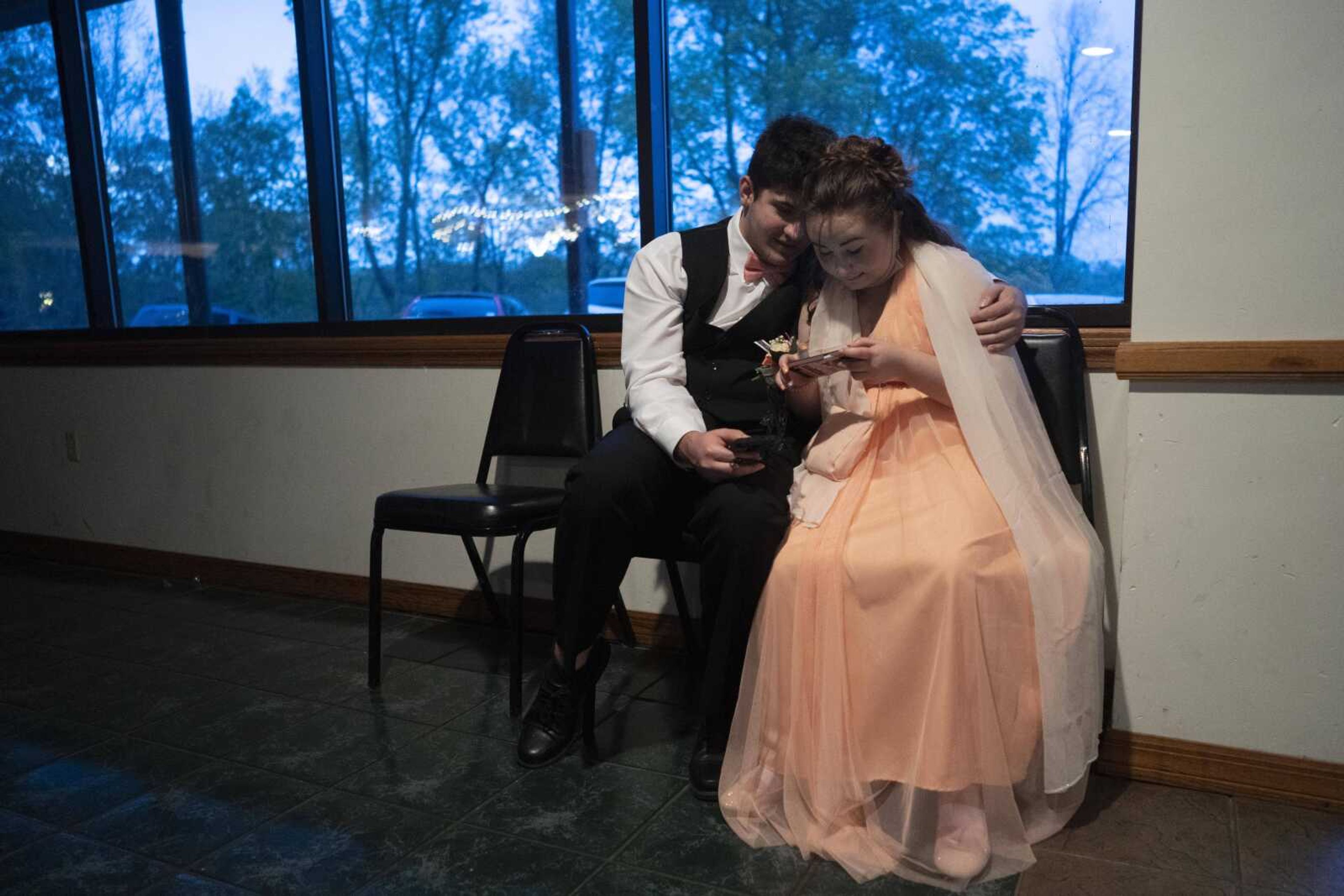 Tye Thorne, left, and Allison Flanner sit together during the Saxony Lutheran prom Saturday, April 26, 2021, at  the Elks Lodge in Cape Girardeau.