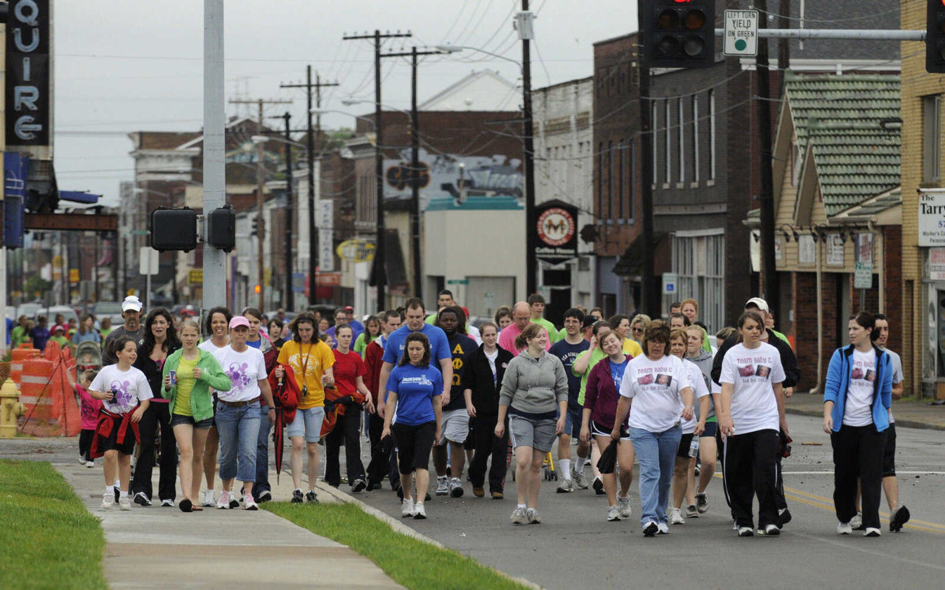 KRISTIN EBERTS ~ keberts@semissourian.com

Participants pass down Broadway Street during the March of Dimes March for Babies in Cape Girardeau, Mo., on Saturday, May 1, 2010.