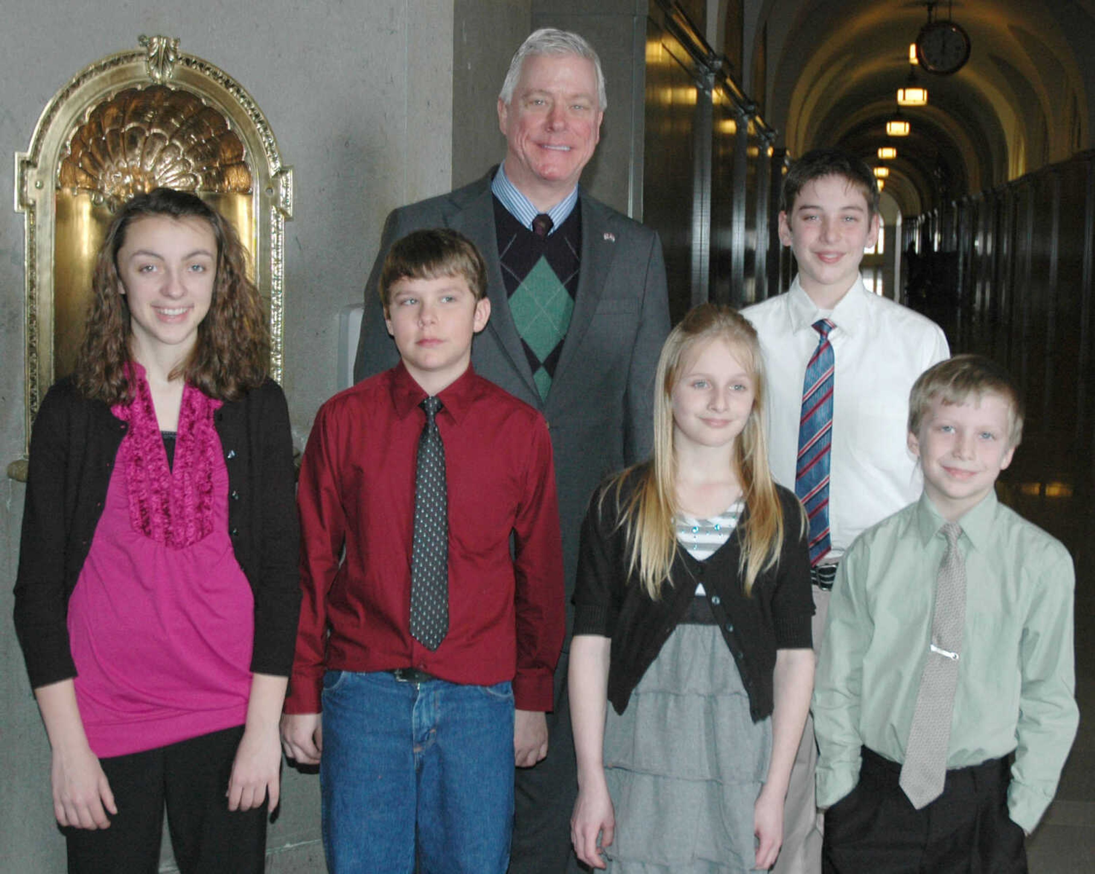 From left are some of the students who attended Citizen’s Day for Arts at the legislature February 10: Emma Mueller, grade 7, of Immanuel Lutheran School, Perryville; David Pettit, grade 7, Bloomfield R-14; Lt. Gov. Peter Kinder; Jewel Chism, grade 4, Bloomfield R-14; Chris Siler, grade 6, Puxico R-8; and Nathan Kamiskas, grade 3, Woodland Elementary.