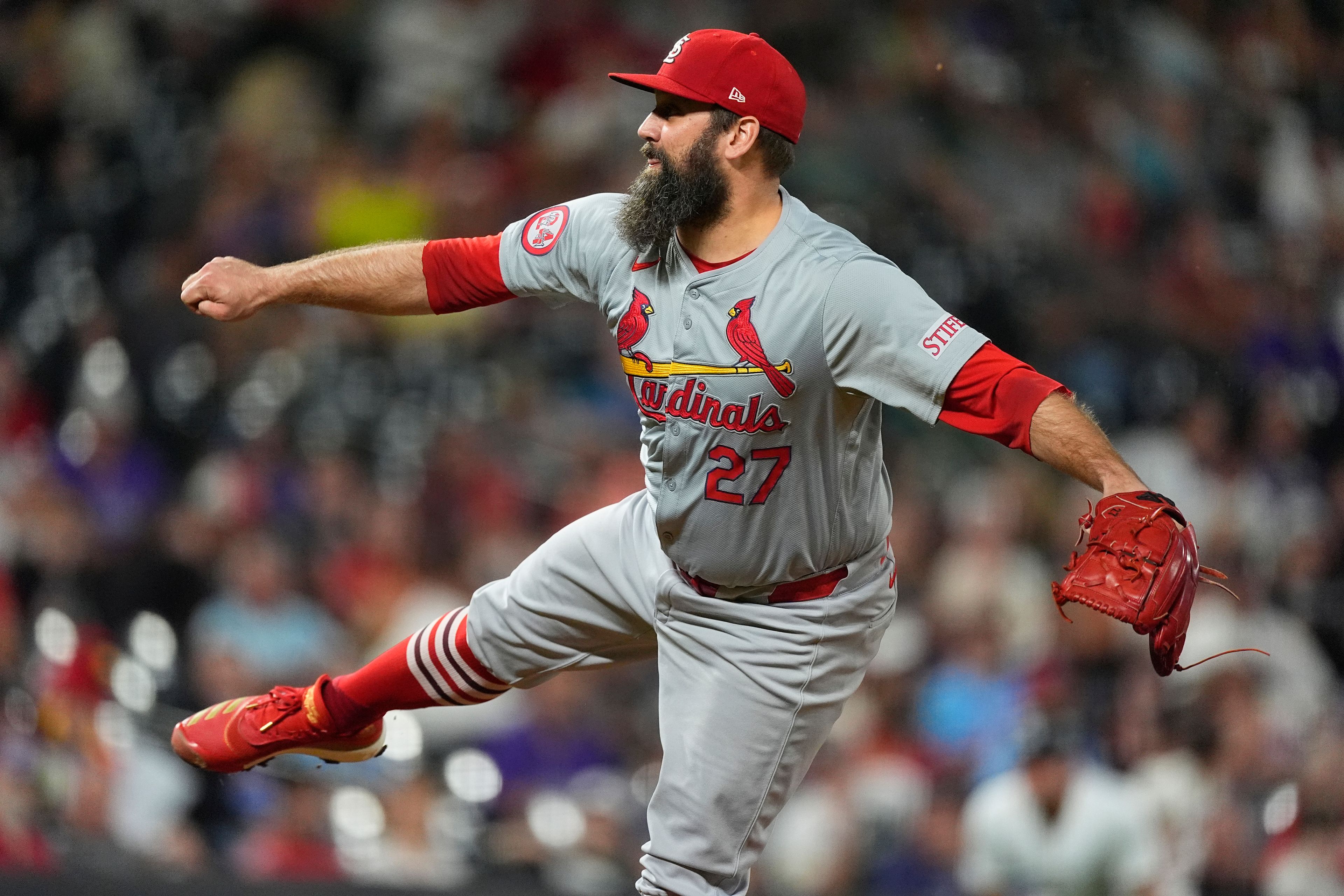 St. Louis Cardinals relief pitcher Andrew Kittredge works against the Colorado Rockies in eighth inning of a baseball game Wednesday, Sept. 25, 2024, in Denver. (AP Photo/David Zalubowski)