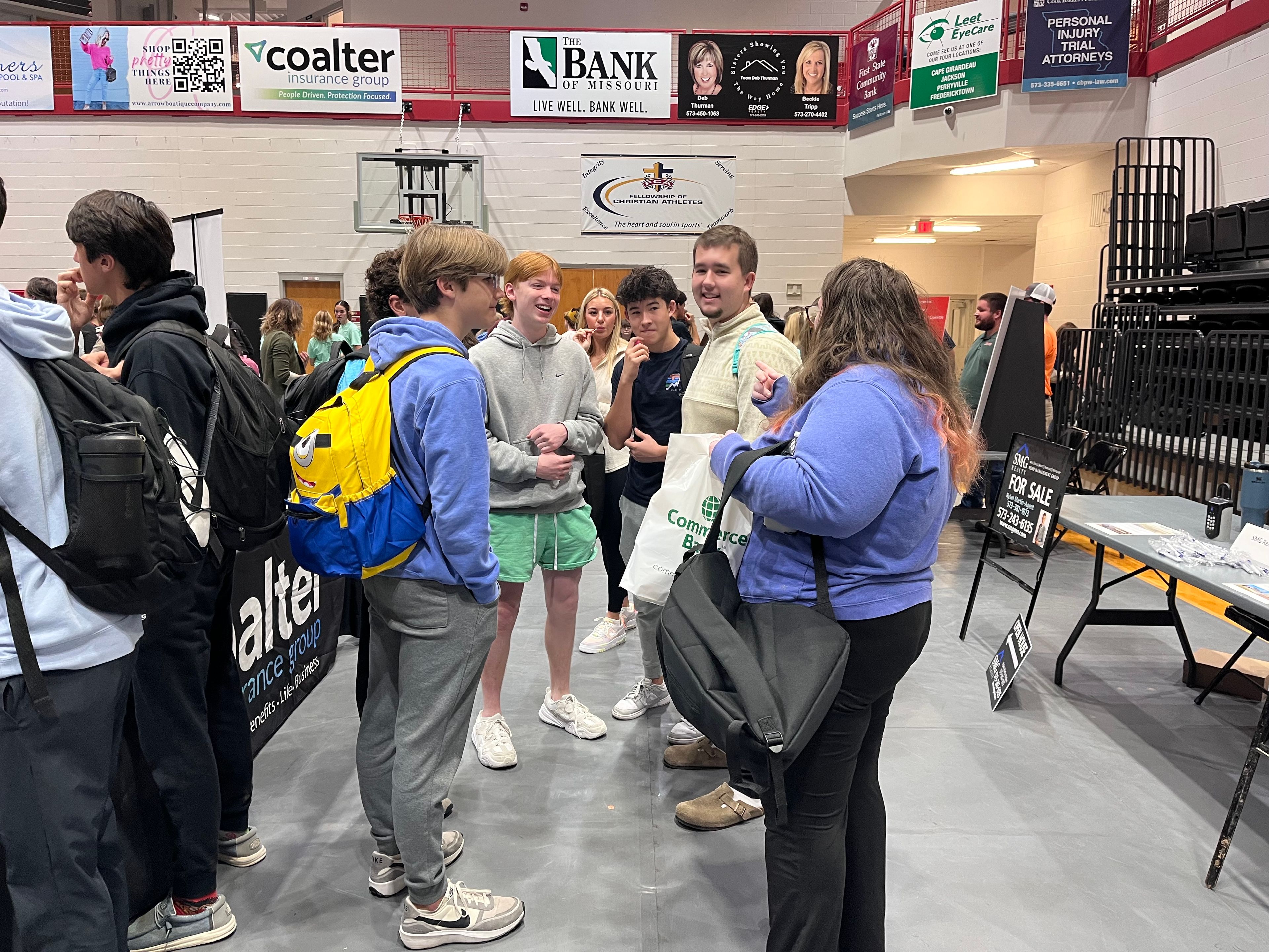 Jackson High School students talk with each other during the annual Jackson Opportunities in Business (J.O.B.) Fair on Wednesday at JHS. 