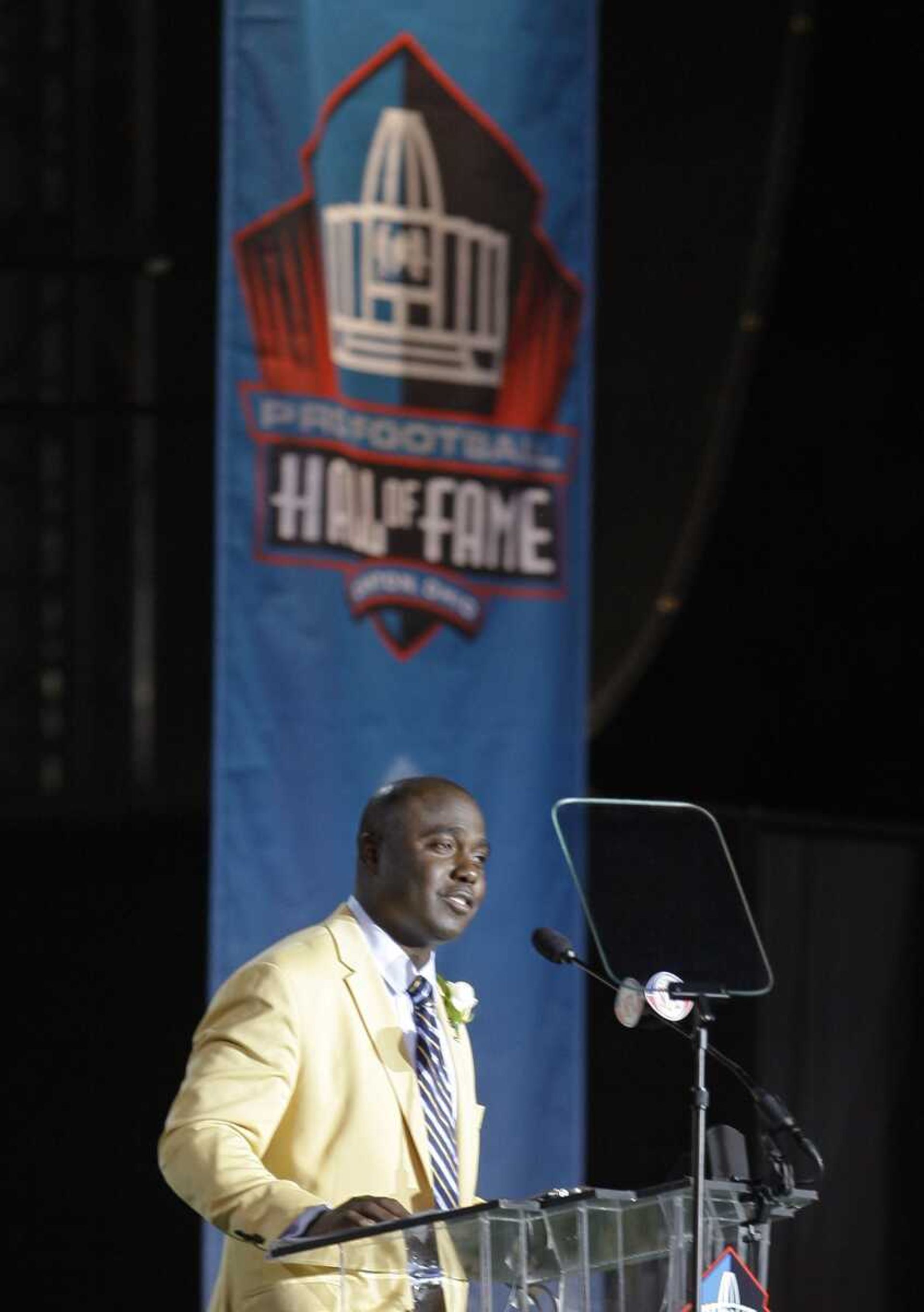 Marshall Faulk speaks Saturday during his induction at the Pro Football Hall of Fame in Canton, Ohio. (TONY DEJAK ~ Associated Press)