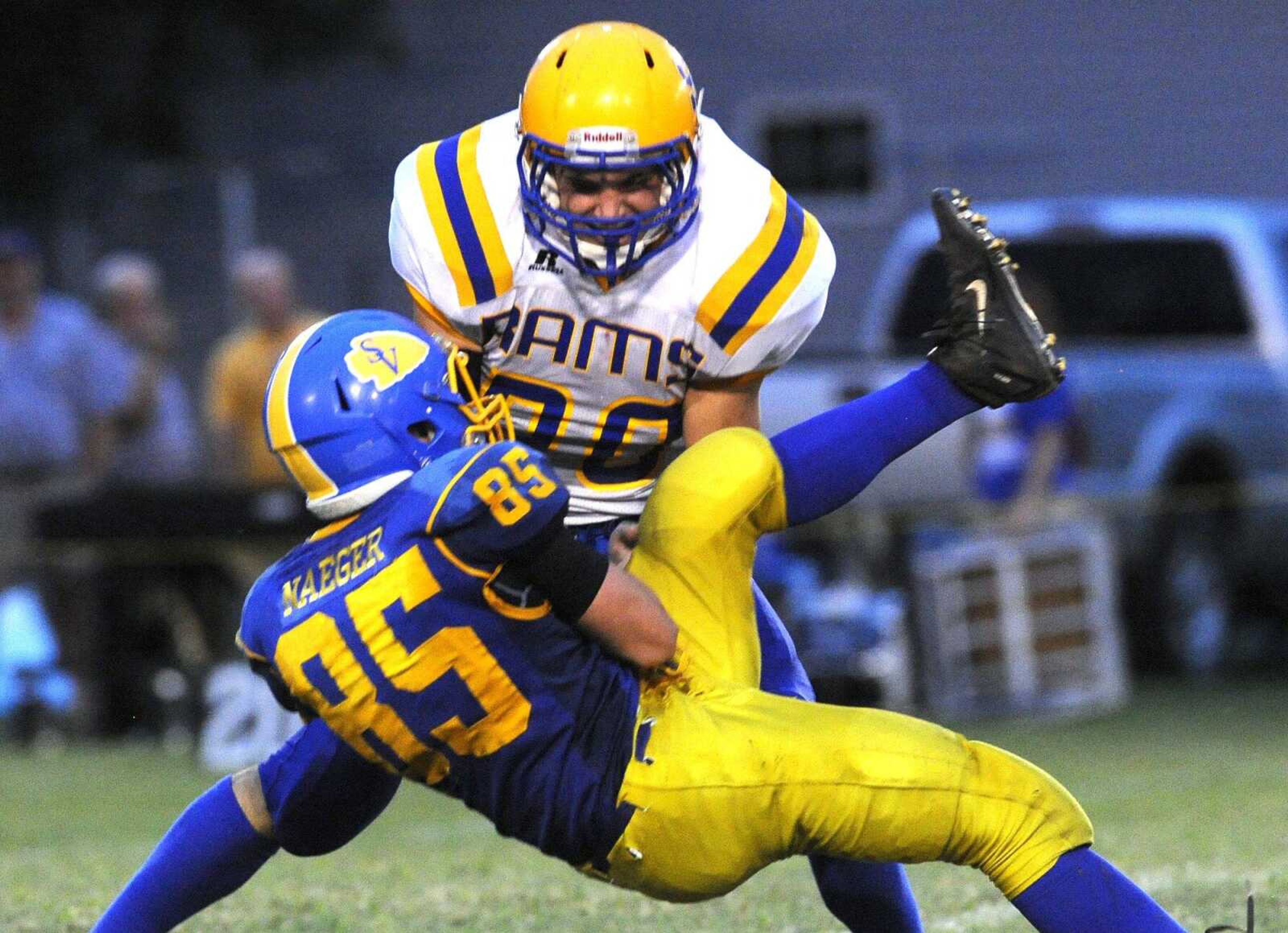 St. Vincent's Gabe Naeger and Scott City's Jaden Kaiser fight for a pass reception intended for Kaiser during the second quarter Friday, Aug. 26, 2016 in Perryville, Missouri. The officials awarded possession of the ball to Scott City.