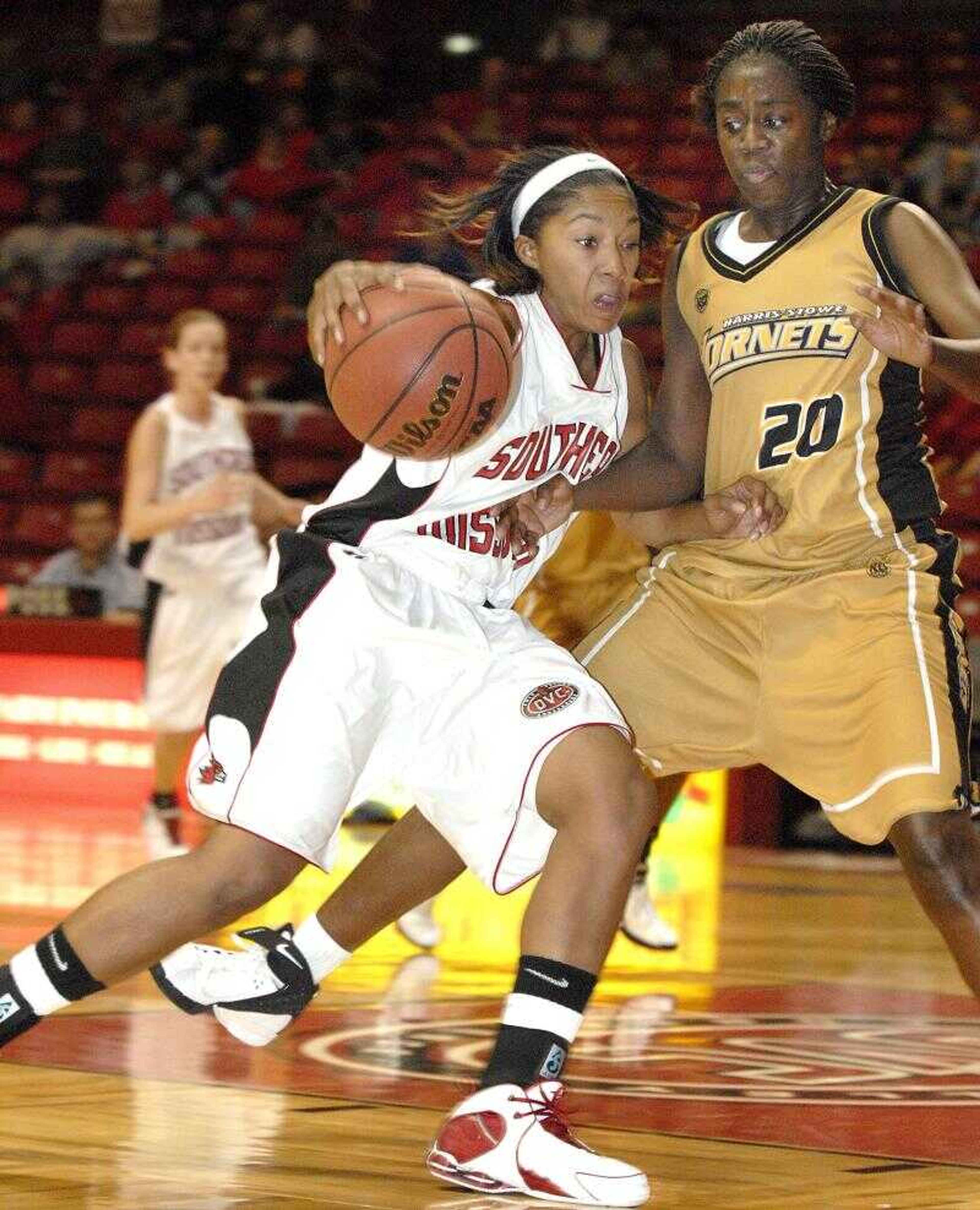 Southeast Missouri State's Ashley Lovelady drove past Harris-Stowe's Laniya Stevens during the first half of Tuesday's game at the Show Me Center. (Don Frazier)