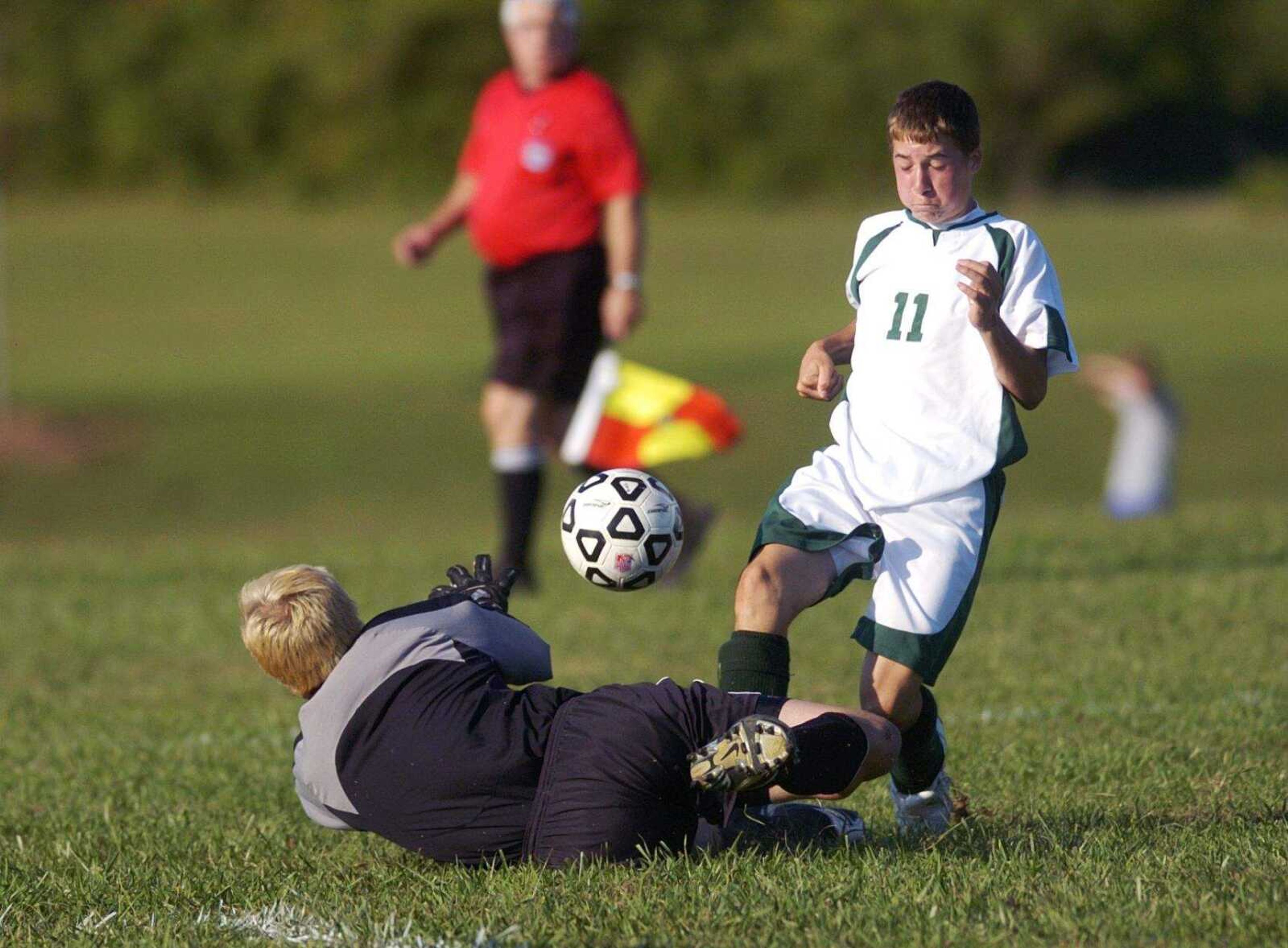 CHUCK WU ~ cwu@semissourian.com
Goalie Ryan Bass blocks the ball from Perryville's Alex Robinson.