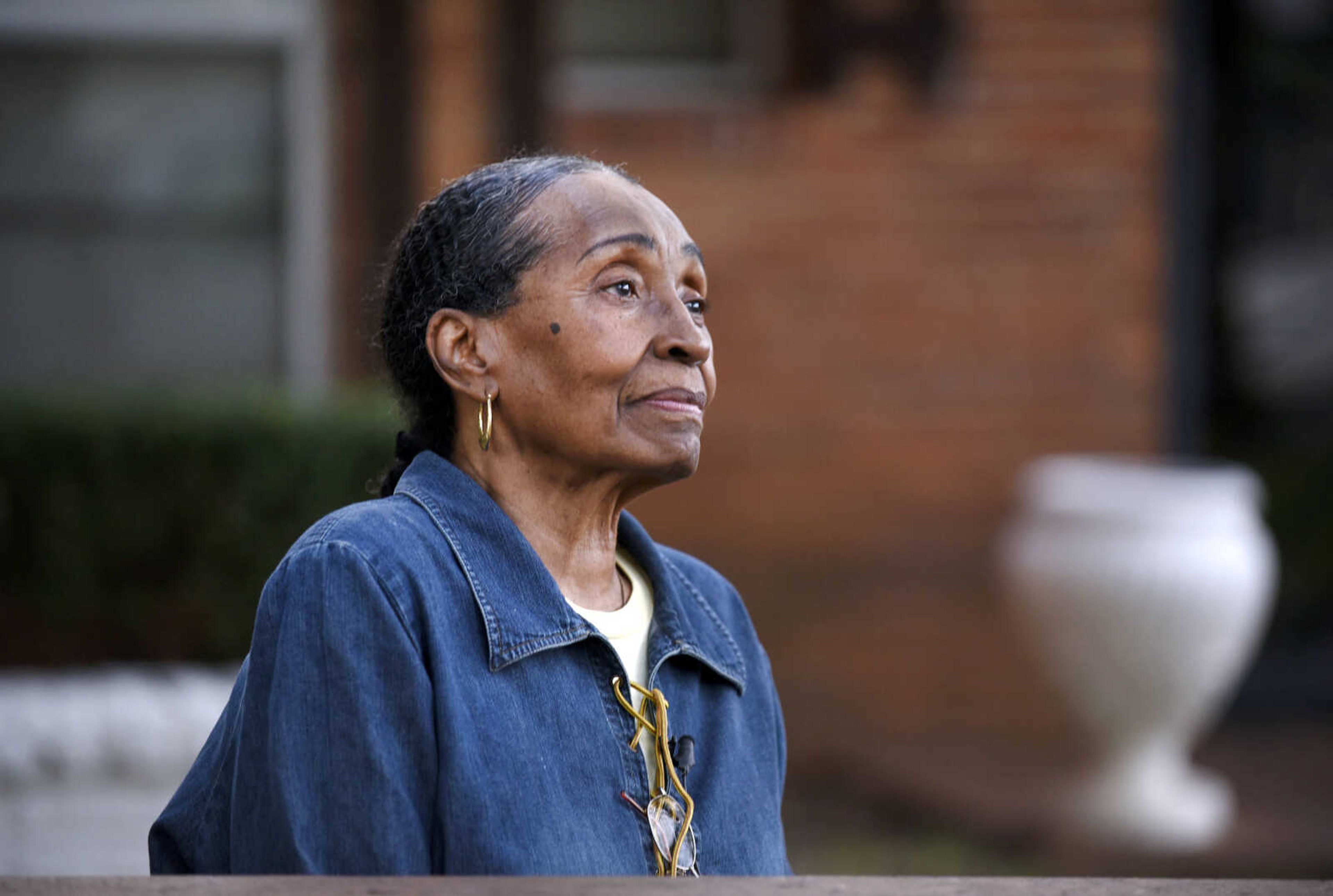 LAURA SIMON ~ lsimon@semissourian.com

Ella Sumlin sits outside the house at 333 Dixie Street in Sikeston, Missouri in September. Sumlin was at the house for a fish fry on the night of Aug. 5, 2000.