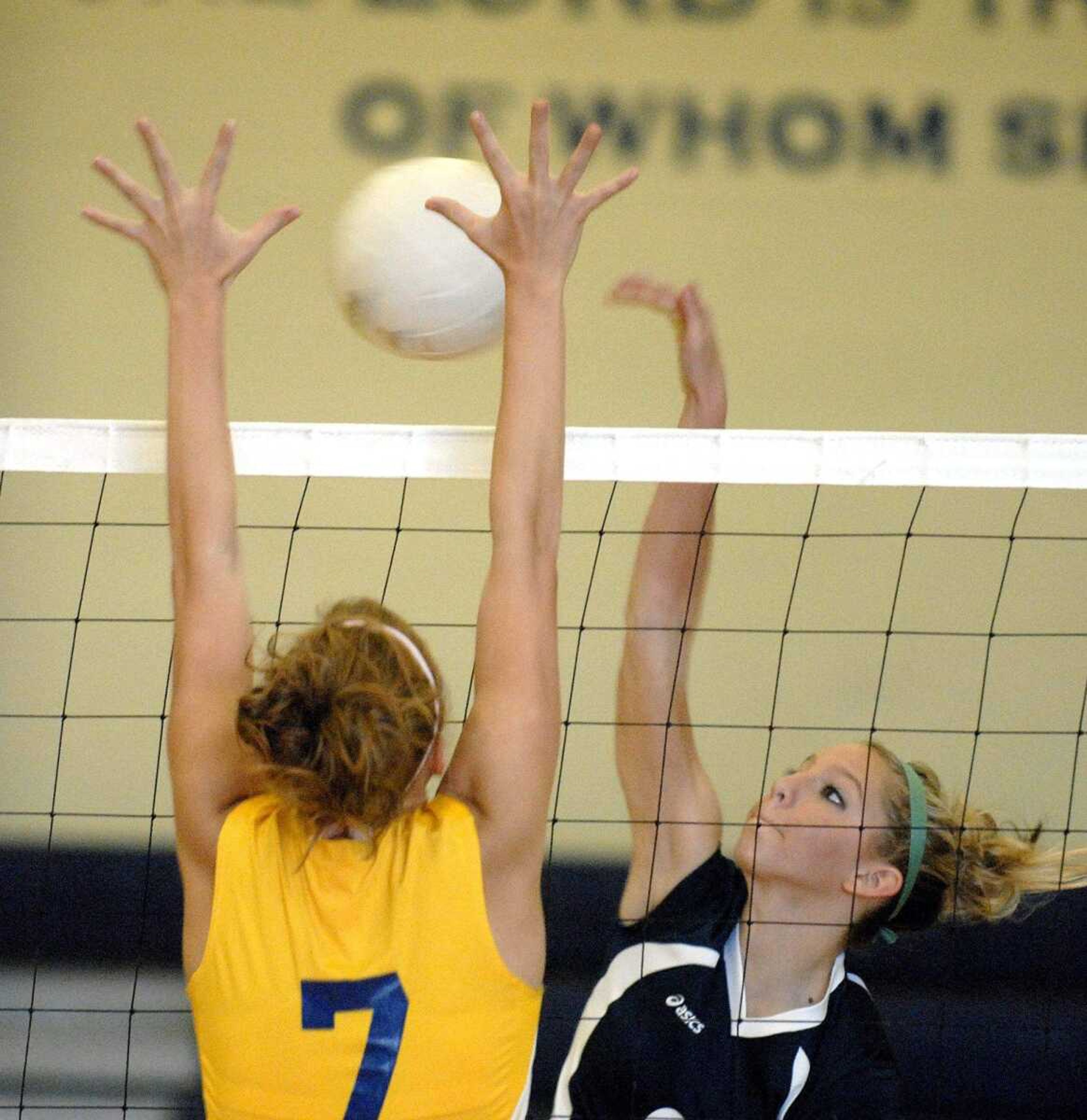 ELIZABETH DODD ~ edodd@semissourian.com
Saxony's Kari Hadler attempts a kill against St. Vincent's Kali Wingerter in the first game of a St. Vincent victory 2-0 at Saxony Thursday.