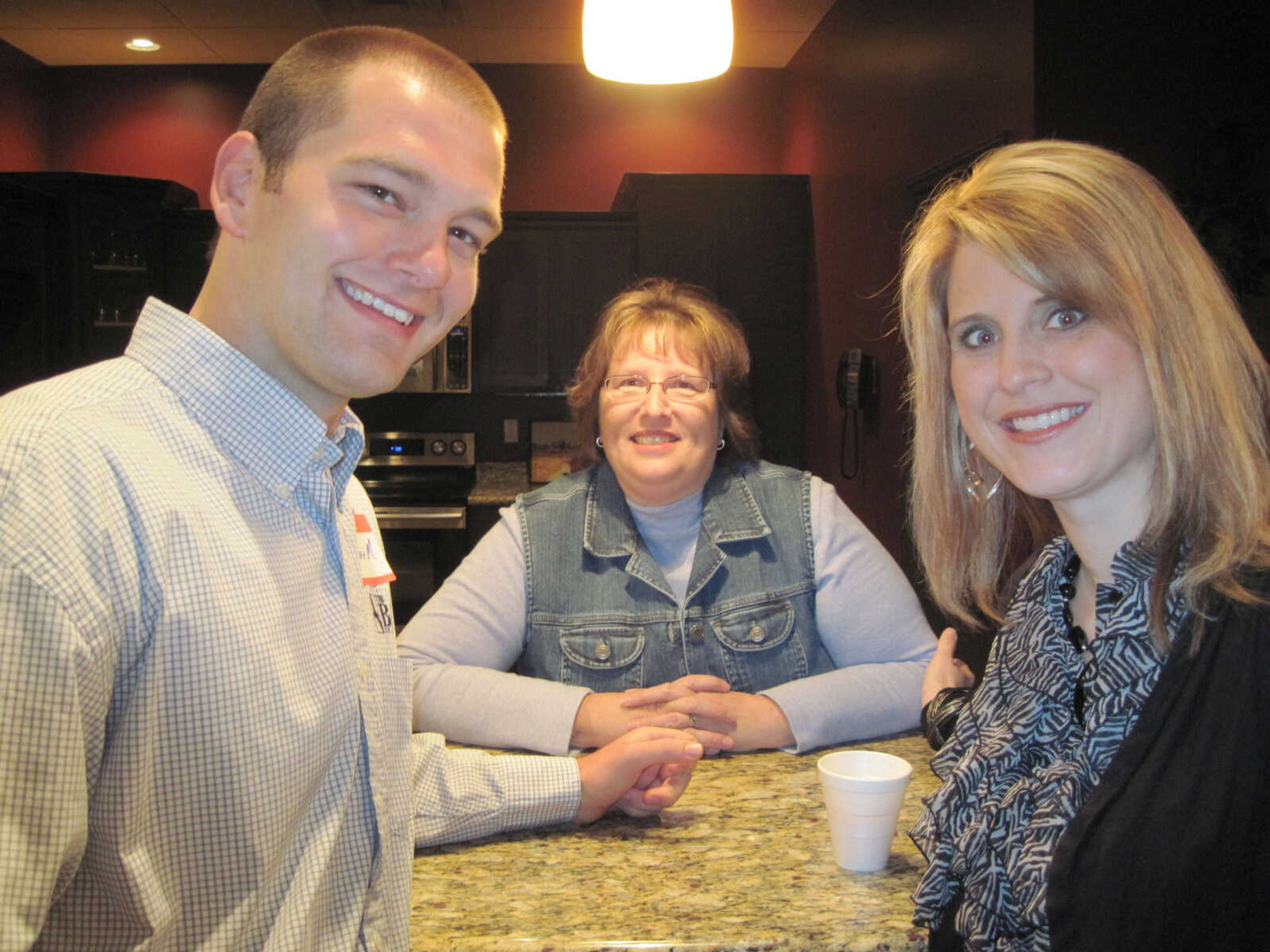 Ronnie Maxwell, Cheryl Merkler and Sara Gerau attend the Jackson Chamber of Commerce Business Breakfast at Creative Edge on Friday, April 9, 2010.