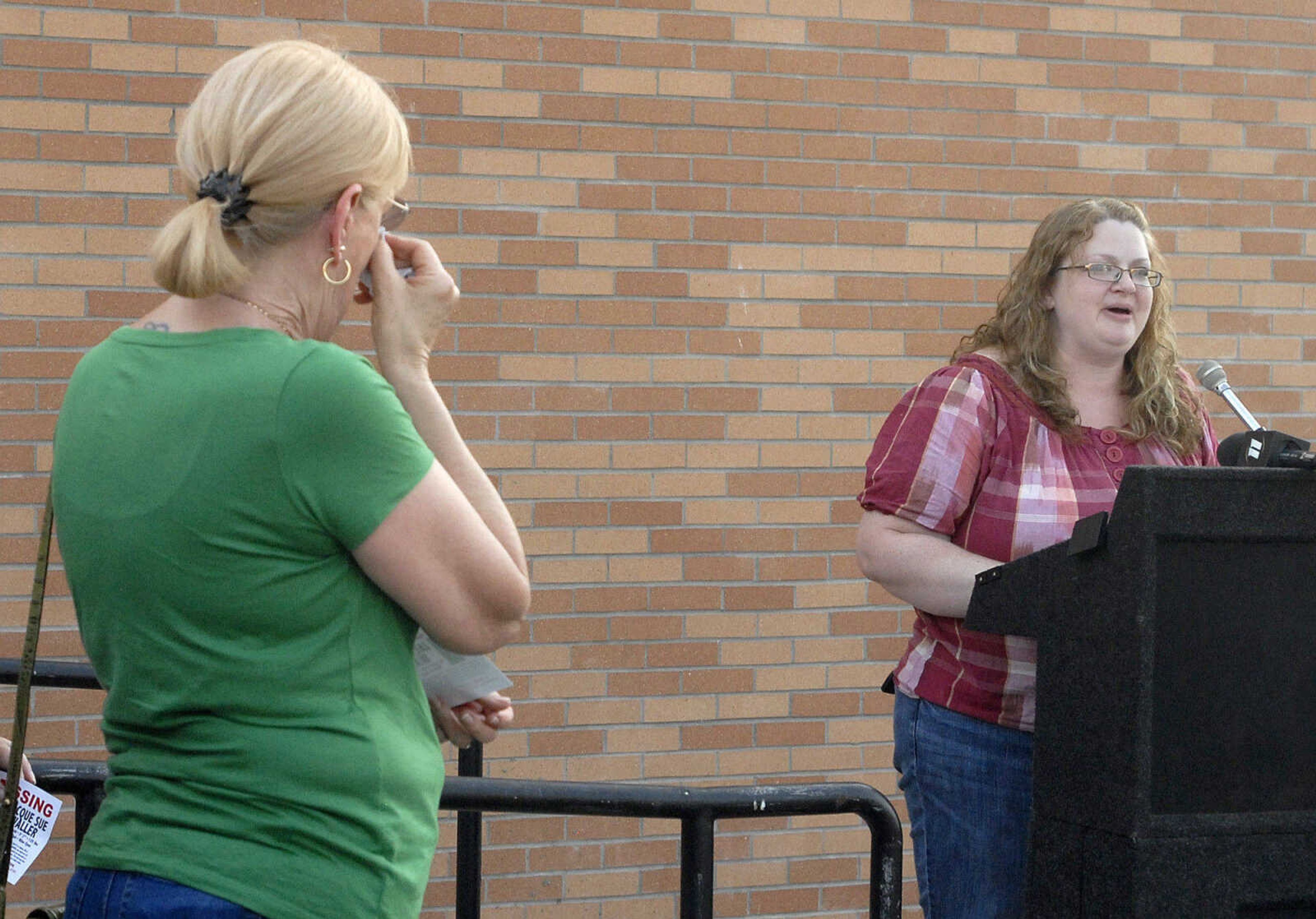 LAURA SIMON~lsimon@semissourian.com
Laurie Black speaks to friends and family of Jacque Sue Waller Thursday, June 9, 2011 during a prayer service for Waller at Farmington High School. Waller, a 39-year-old mother of three, has been missing since June 1, 2011.