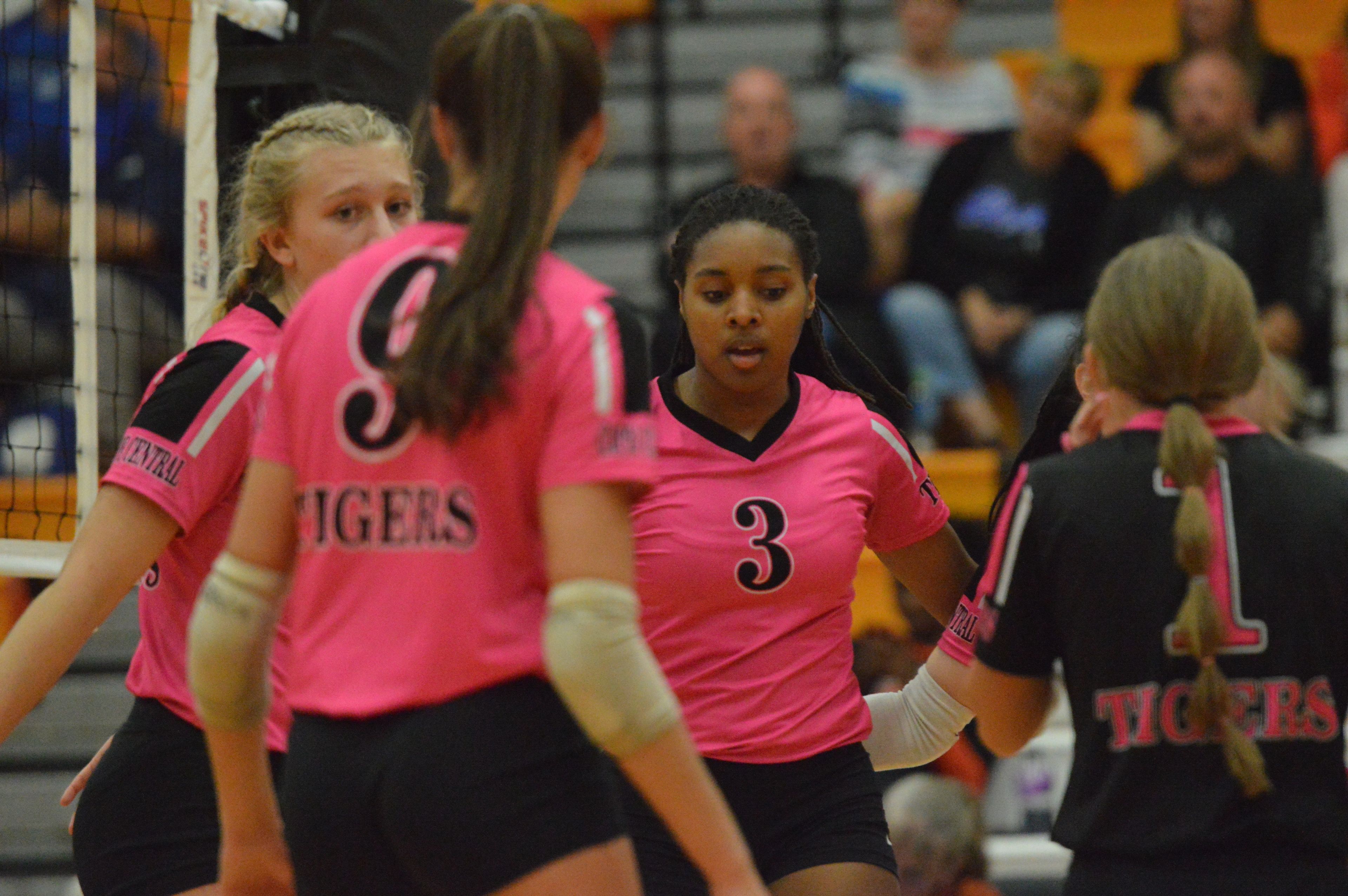 Cape Central senior Nalaiya Furlow, middle, celebrates with her Lady Tiger teammates after tacking on a point for her team against Bernie on Monday, Sept. 16.