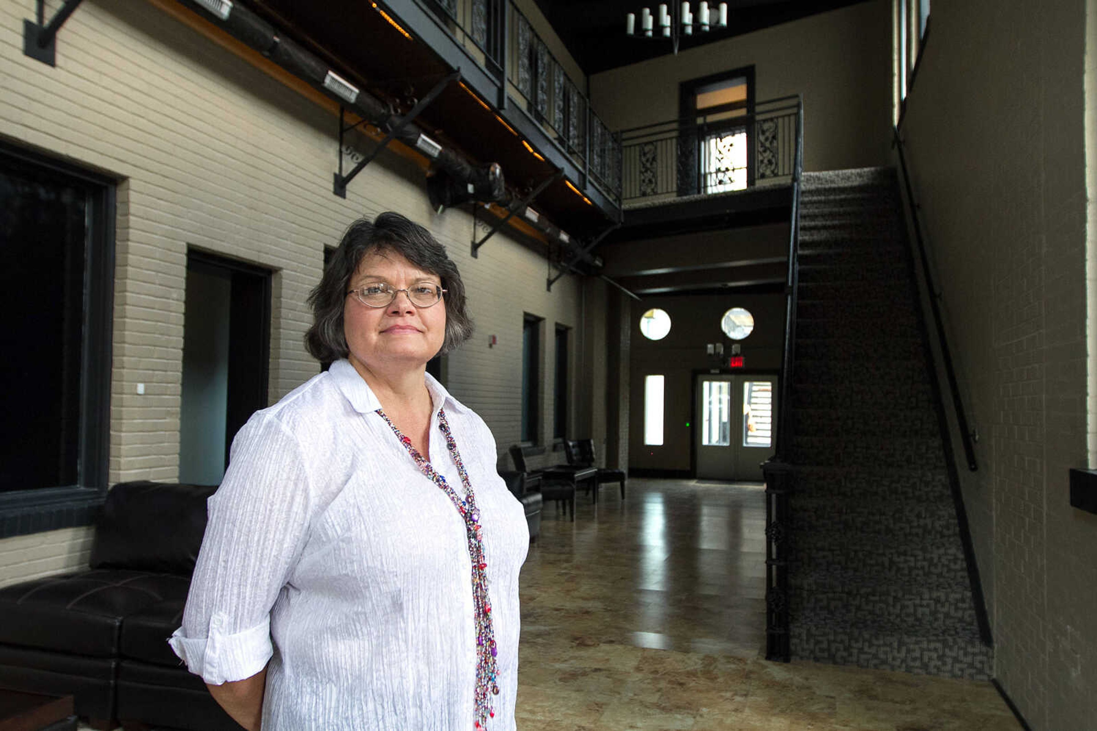 Rebecca Ward stands inside the lobby of the Vasterling Suites in Cape Girardeau. (Glenn Landberg)