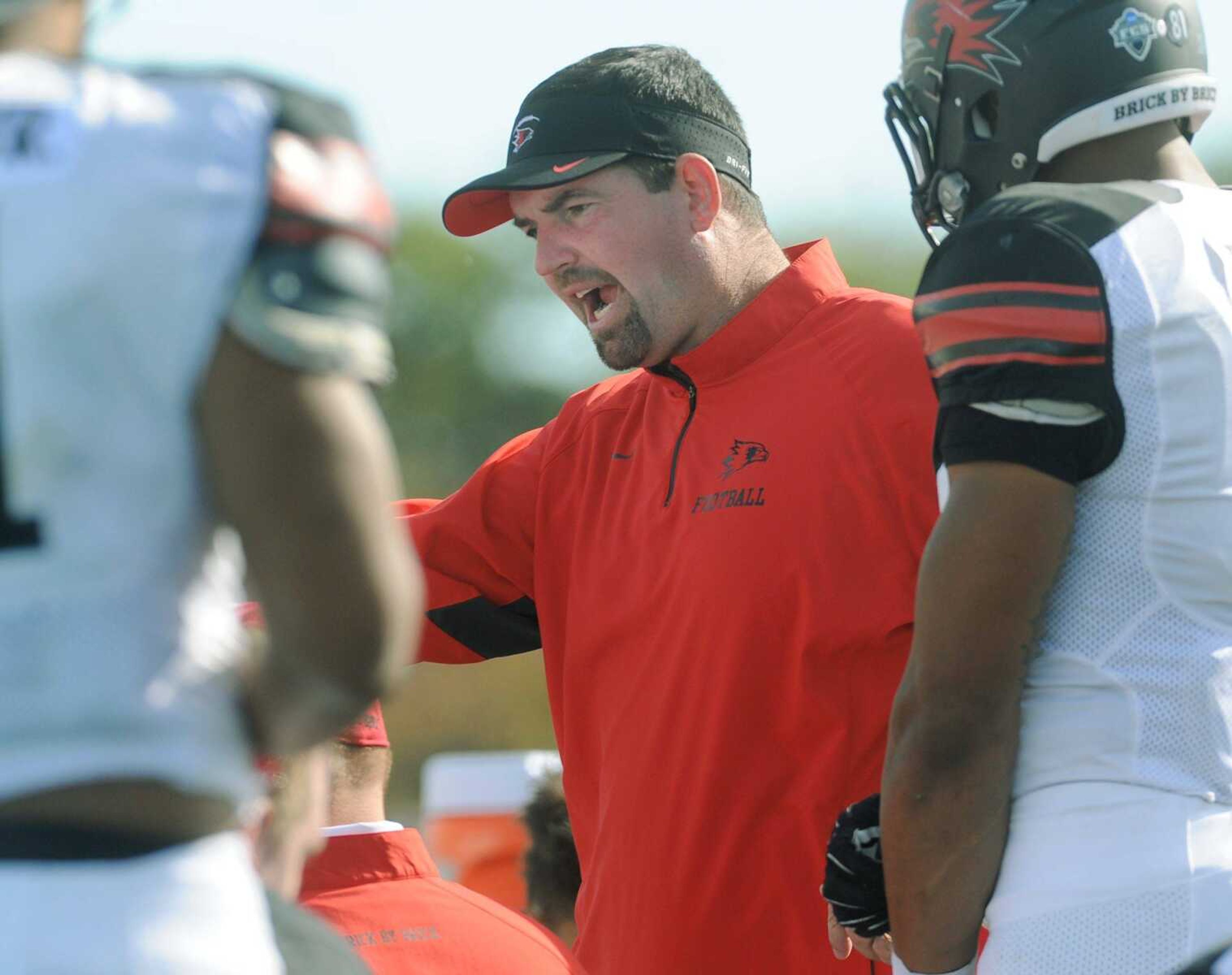 Southeast Missouri State coach Tom Matukewicz talks to his players at the Eastern Illinois game during the second quarter Saturday, Oct. 10, 2015 in Charleston, Illinois. (Fred Lynch)