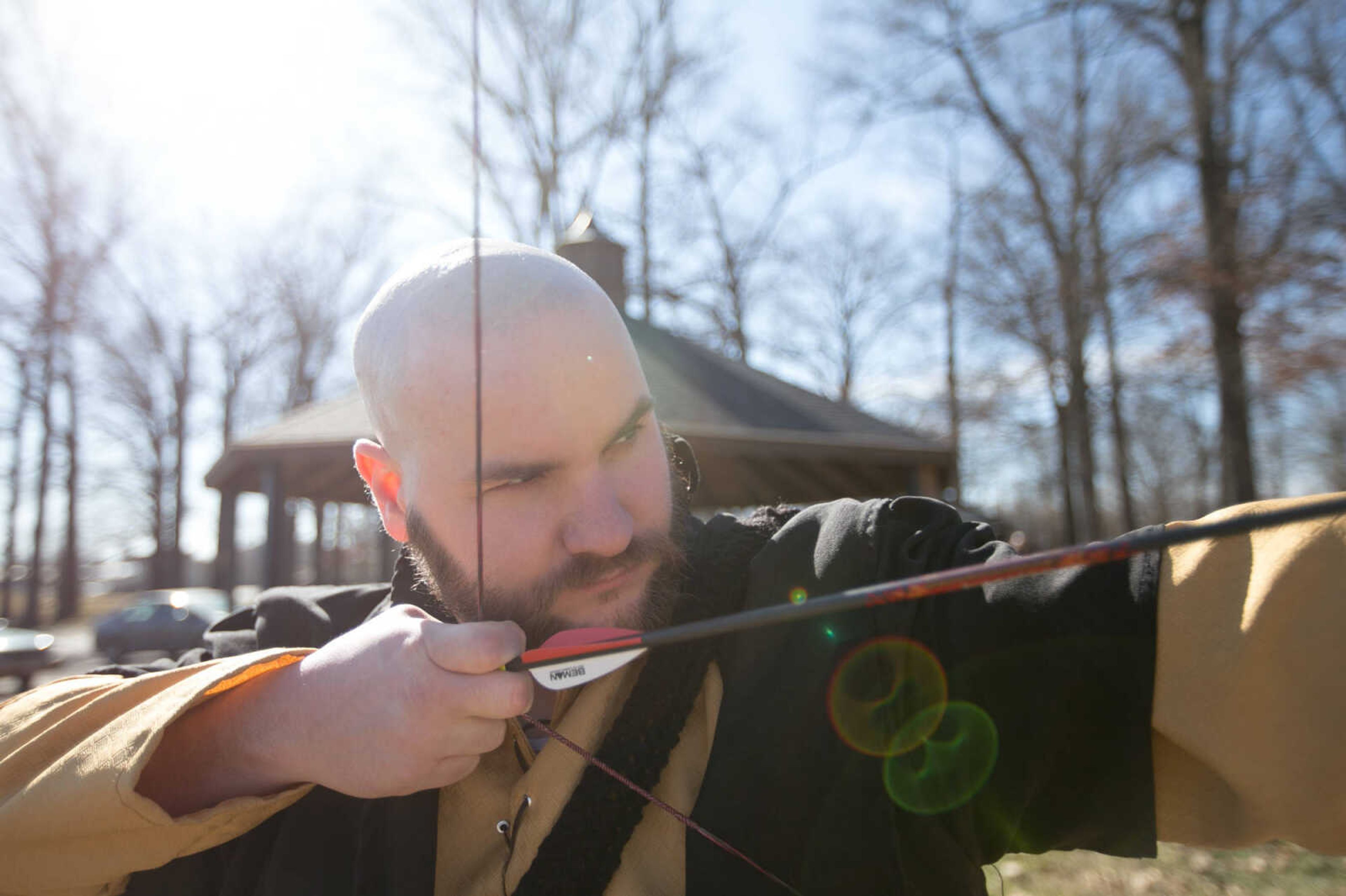 GLENN LANDBERG ~ glandberg@semissourian.com




Andrew Litzelfelner draws a boy back to fire a modified arrow during an Amtgard practice Saturday, Jan. 31, 2016 at Arena Park in Cape Girardeau.