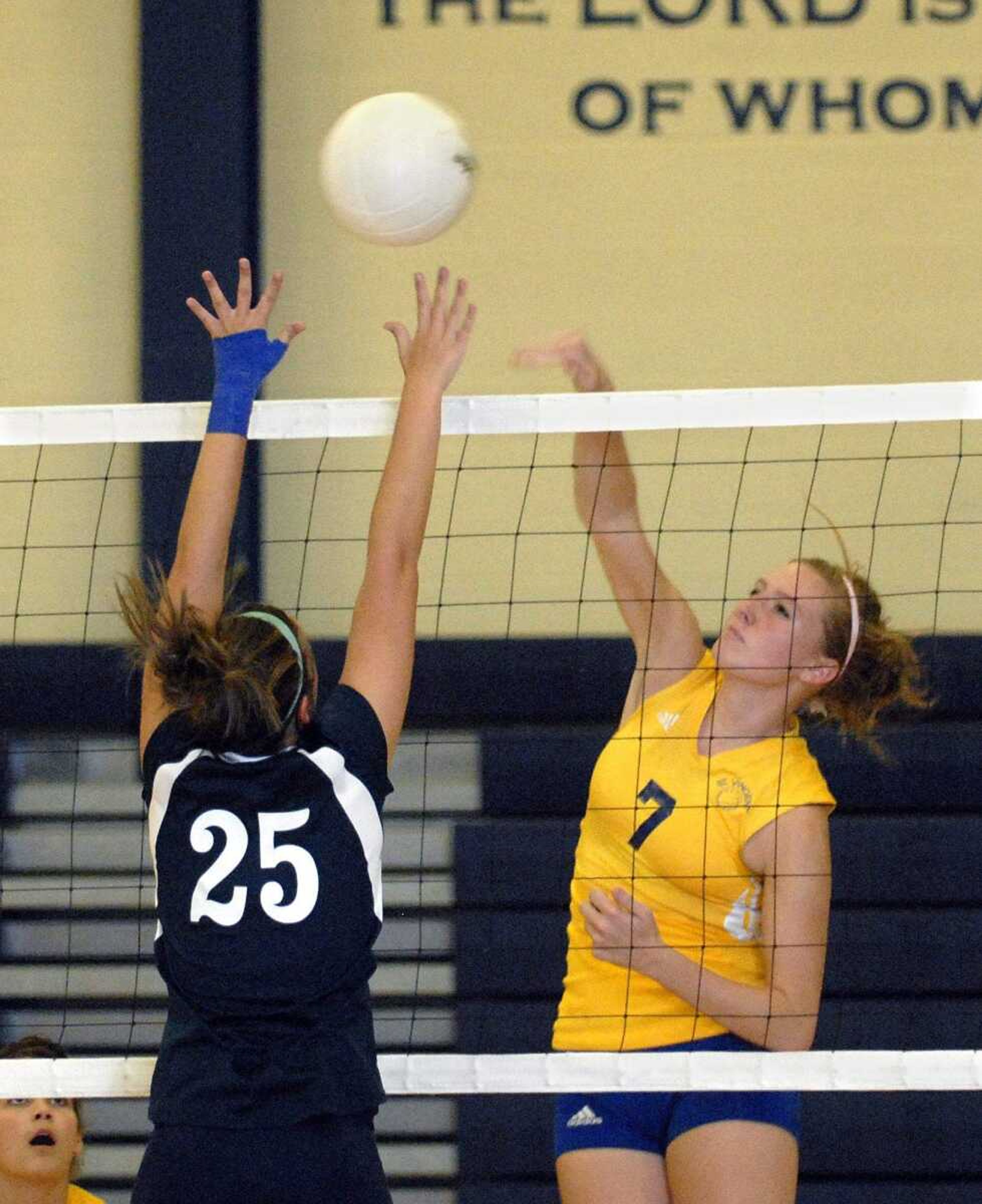 Photo by Josh Buchheit
St. Vincent's Kali Wingerter, right, attempts a kill against Saxony during the second game.