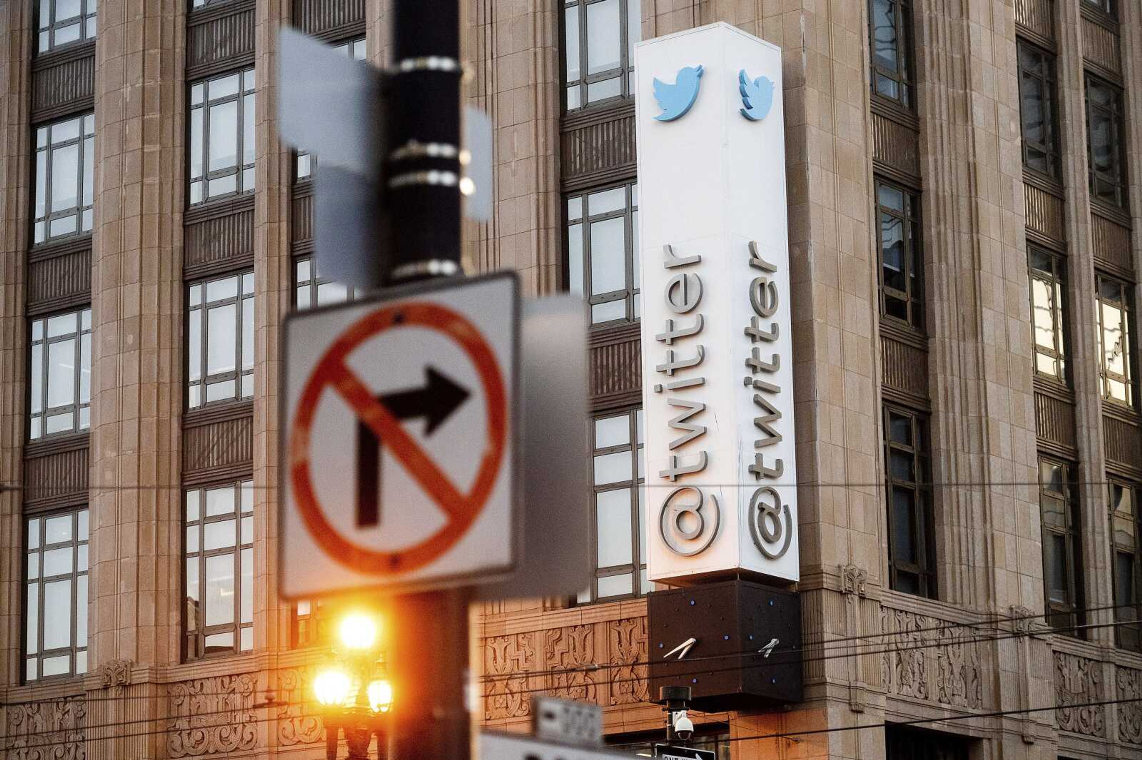 A sign hangs at Twitter headquarters Jan. 11 in San Francisco.