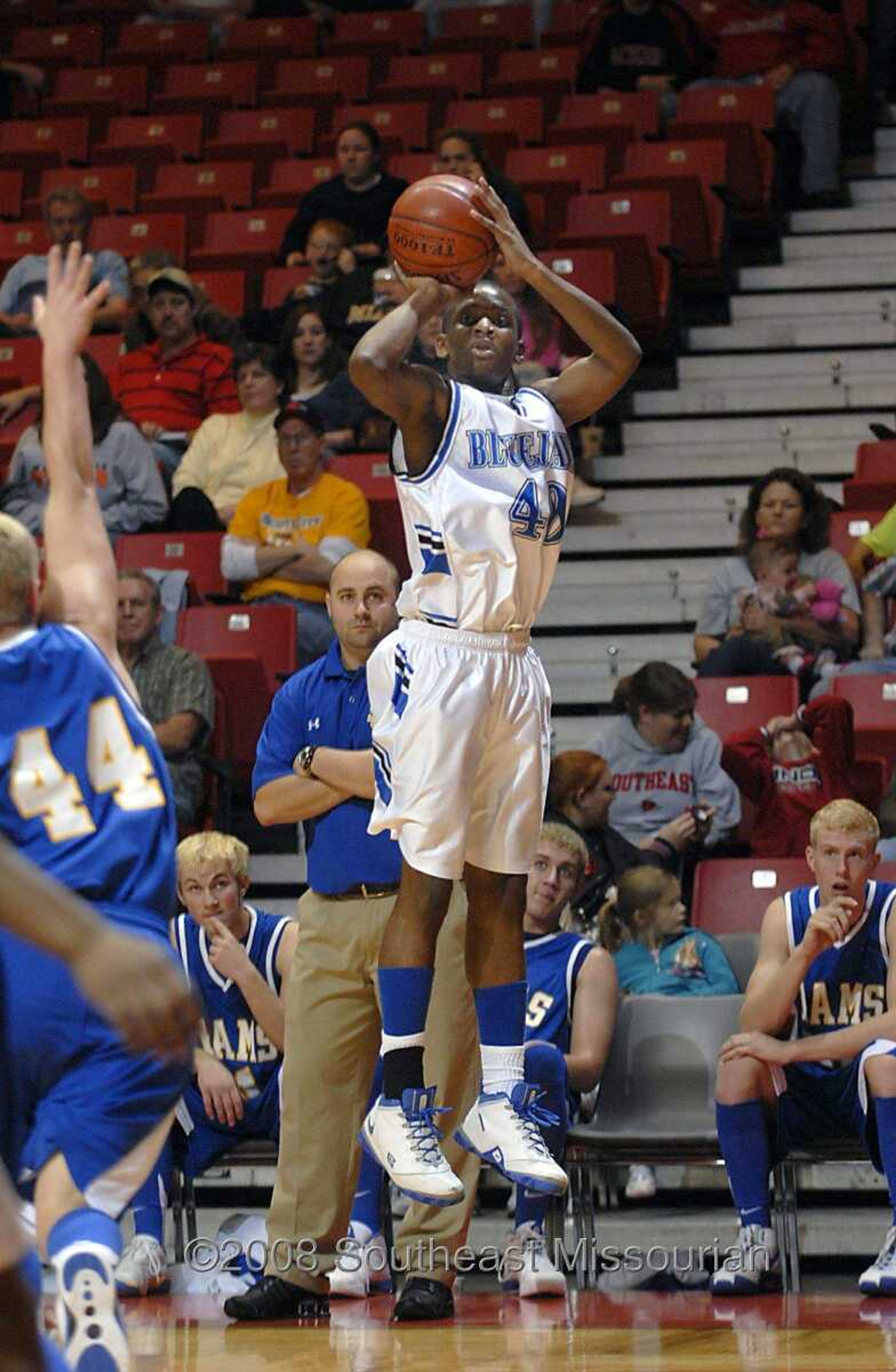 KIT DOYLE ~ kdoyle@semissourian.com
Charleston's Deonte Jones shoots a jumper Friday, December 26, 2008, in the first round of the Southeast Missourian Christmas Tournament at the Show Me Center.