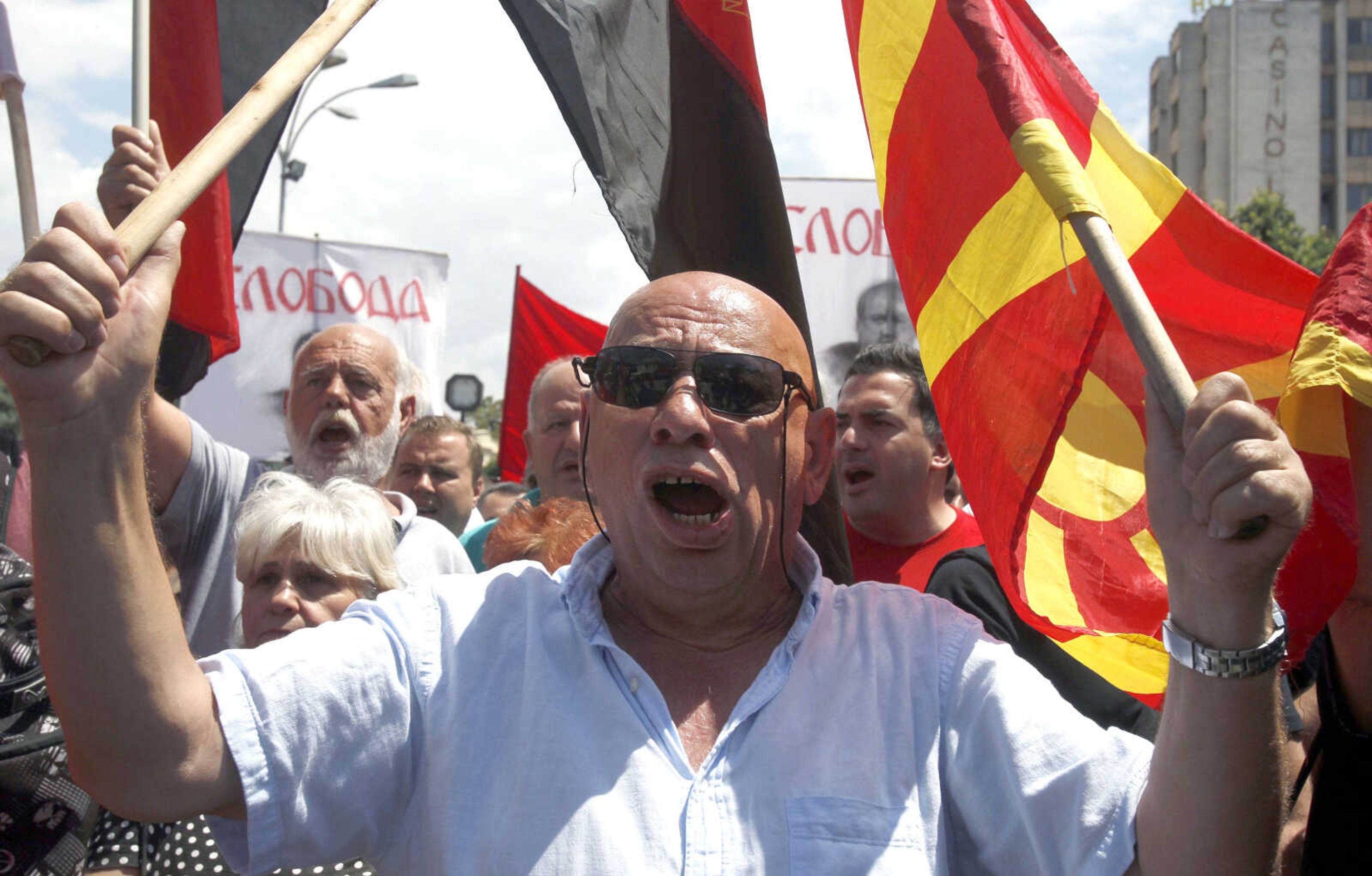 People protest against the deal between Greece and Macedonia on Macedonias new name, North Macedonia, on Sunday in the southern Macedonia town of Bitola. Lawmakers voted 153-127 in the 300-member parliament against the motion brought by the conservative main opposition party over the deal to rename the former Yugoslav republic North Macedonia.