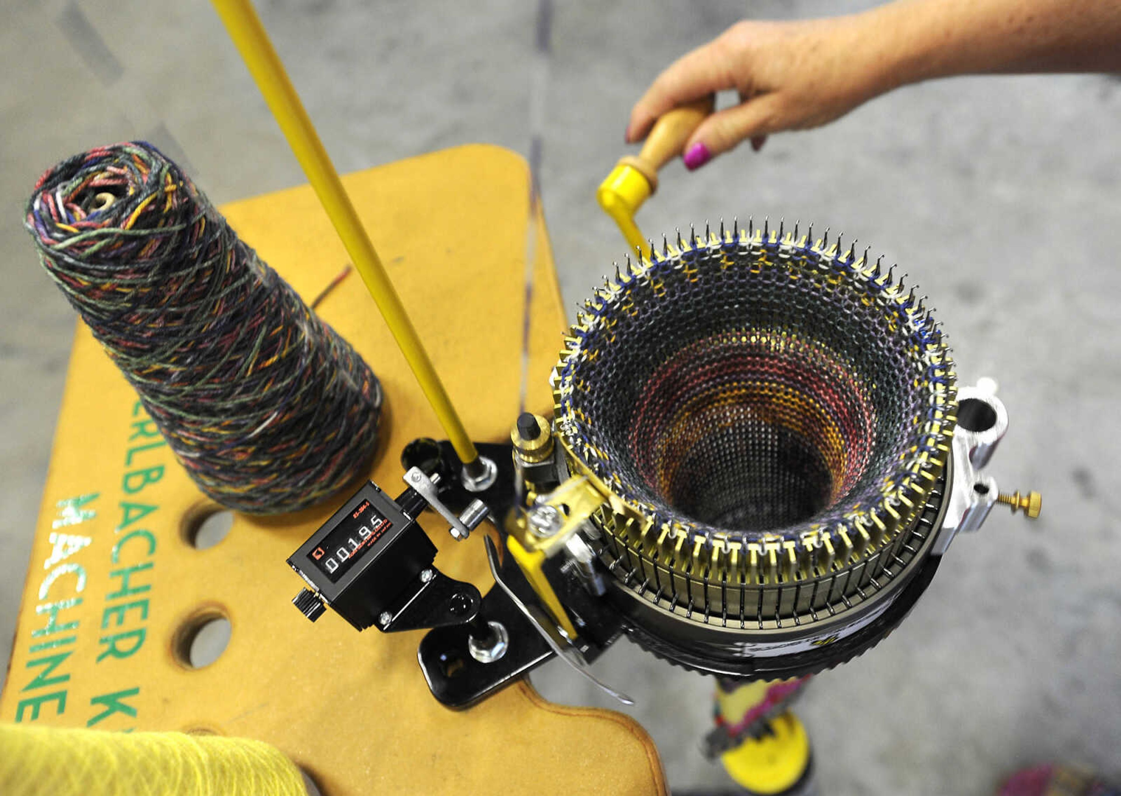 FRED LYNCH ~ flynch@semissourian.com
Joyce Felty operates an Elbacher Knitting Machine to make a hat Thursday, April 20, 2017 during ARTrageous at Erlbacher Gear and Machine Works in Cape Girardeau.