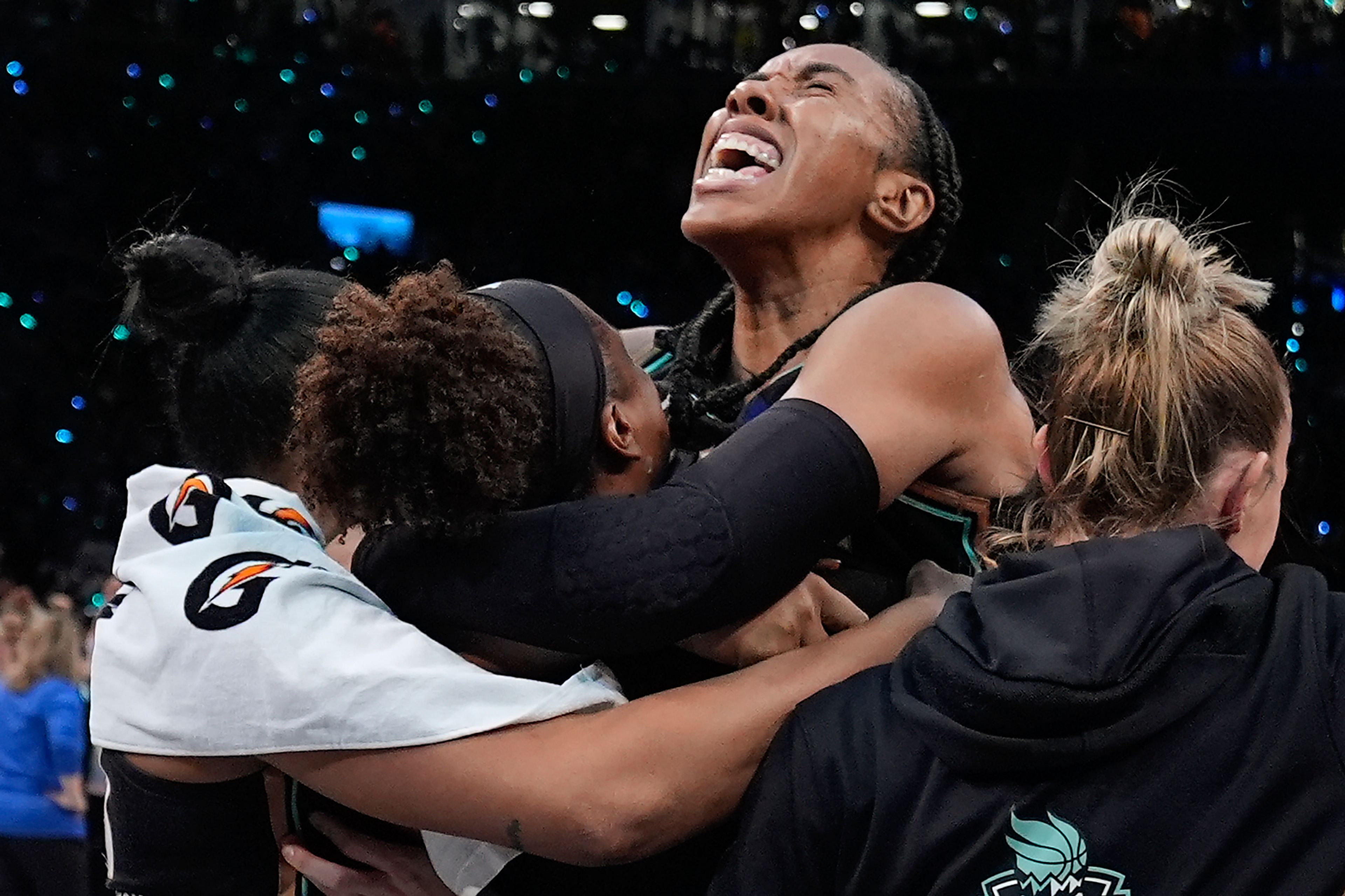 The New York Liberty celebrate after defeating the Minnesota Lynx in Game 5 of the WNBA basketball final series to win the WNBA championship, Sunday, Oct. 20, 2024, in New York. (AP Photo/Pamela Smith)