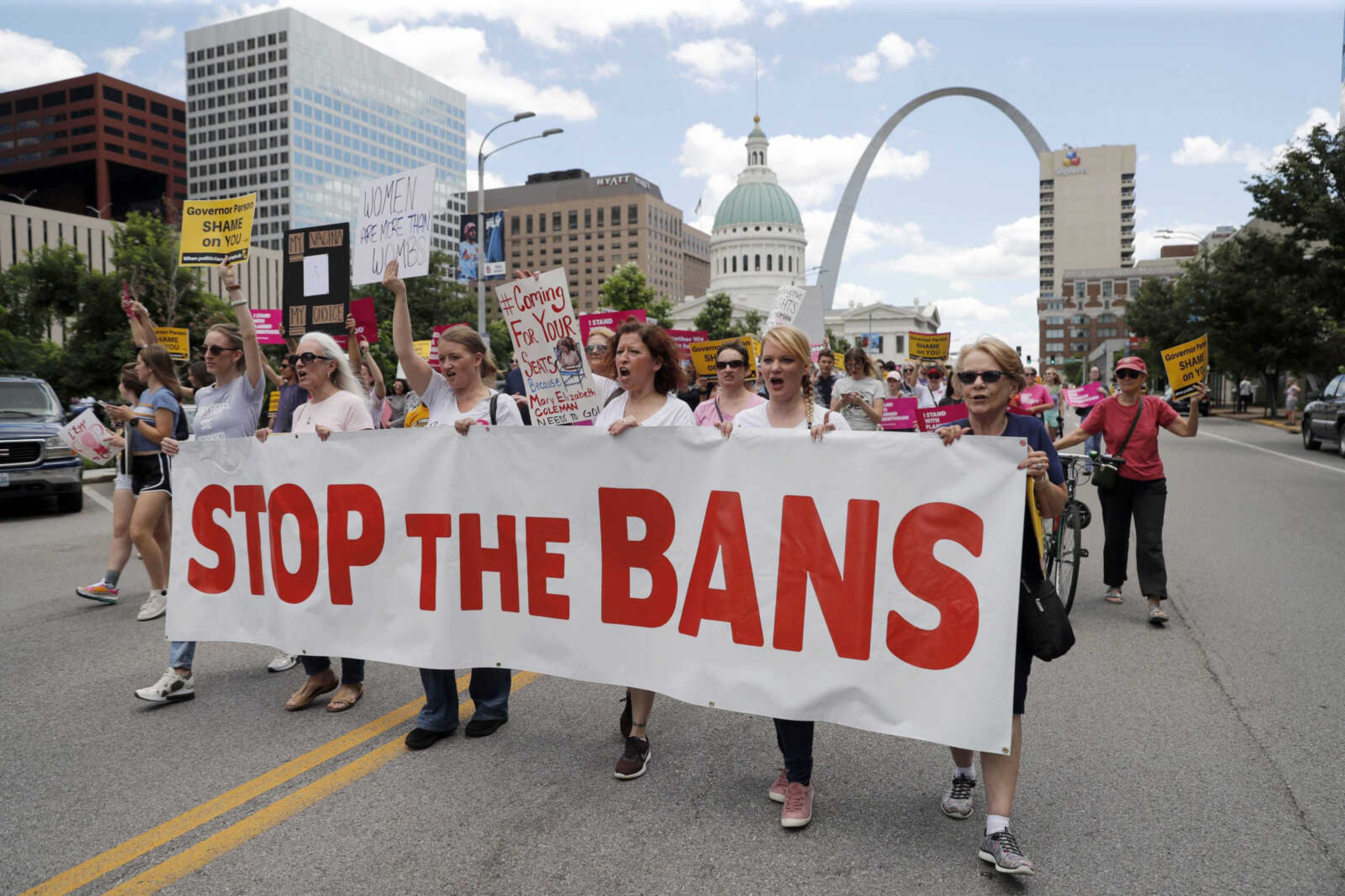 Abortion-rights supporters march Thursday in St. Louis.