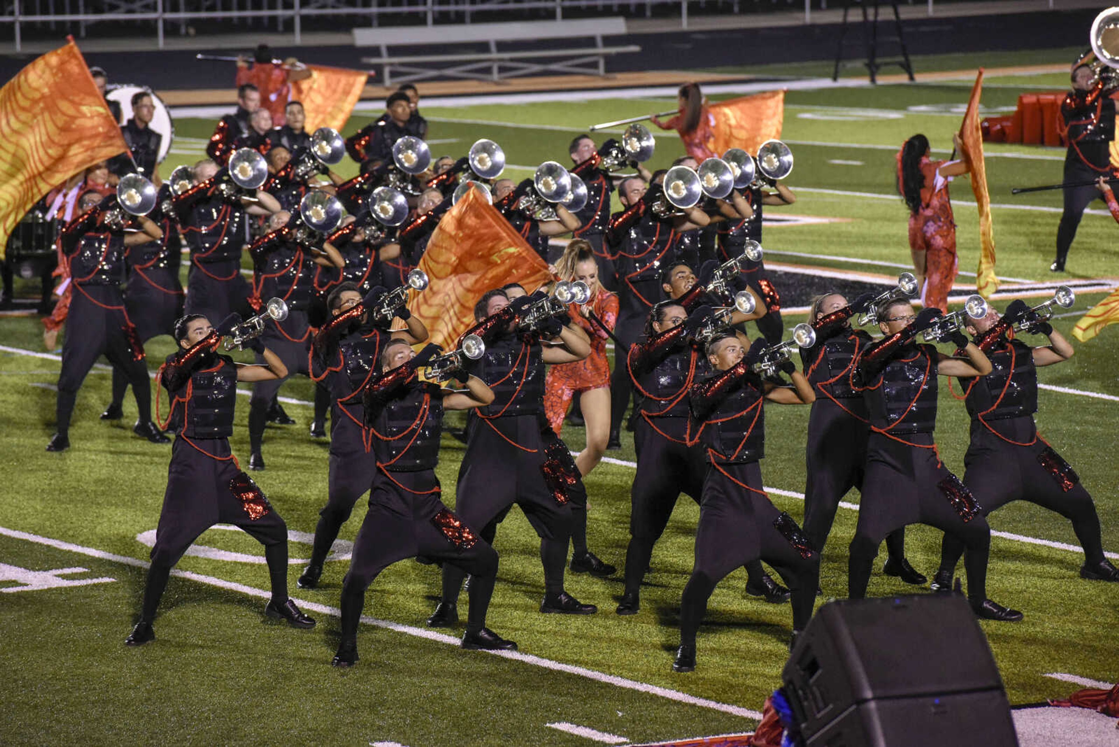 Mandarins from Sacramento, California perform during the Drum Corps International program "Drums Along the Mississippi" at the Cape Central High School field Tuesday Aug. 10, 2021.