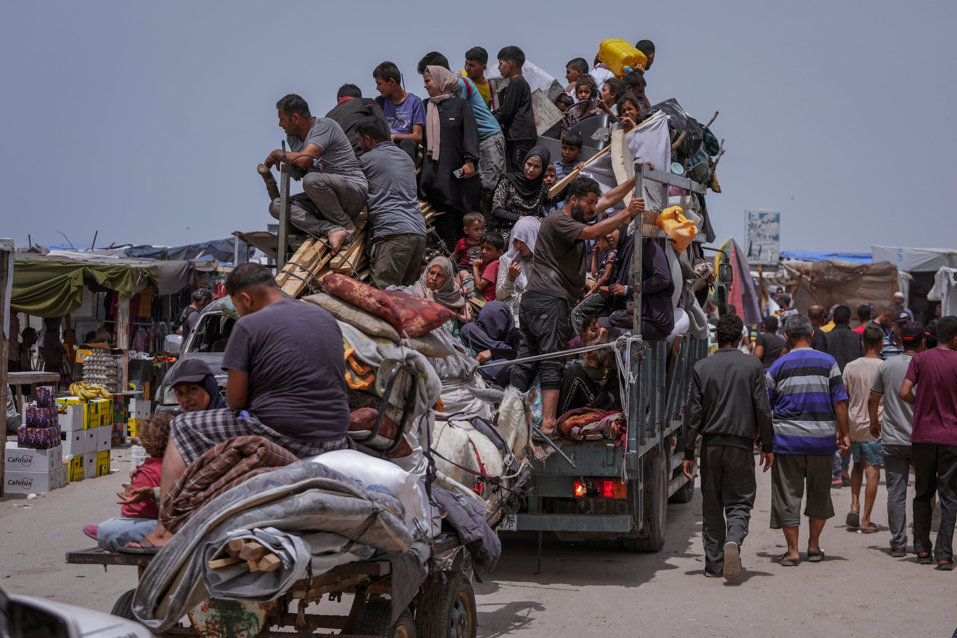 FILE - Palestinians fleeing from the southern Gaza city of Rafah during an Israeli ground and air offensive in the city on Tuesday, May 28, 2024. (AP Photo/Abdel Kareem Hana, File)