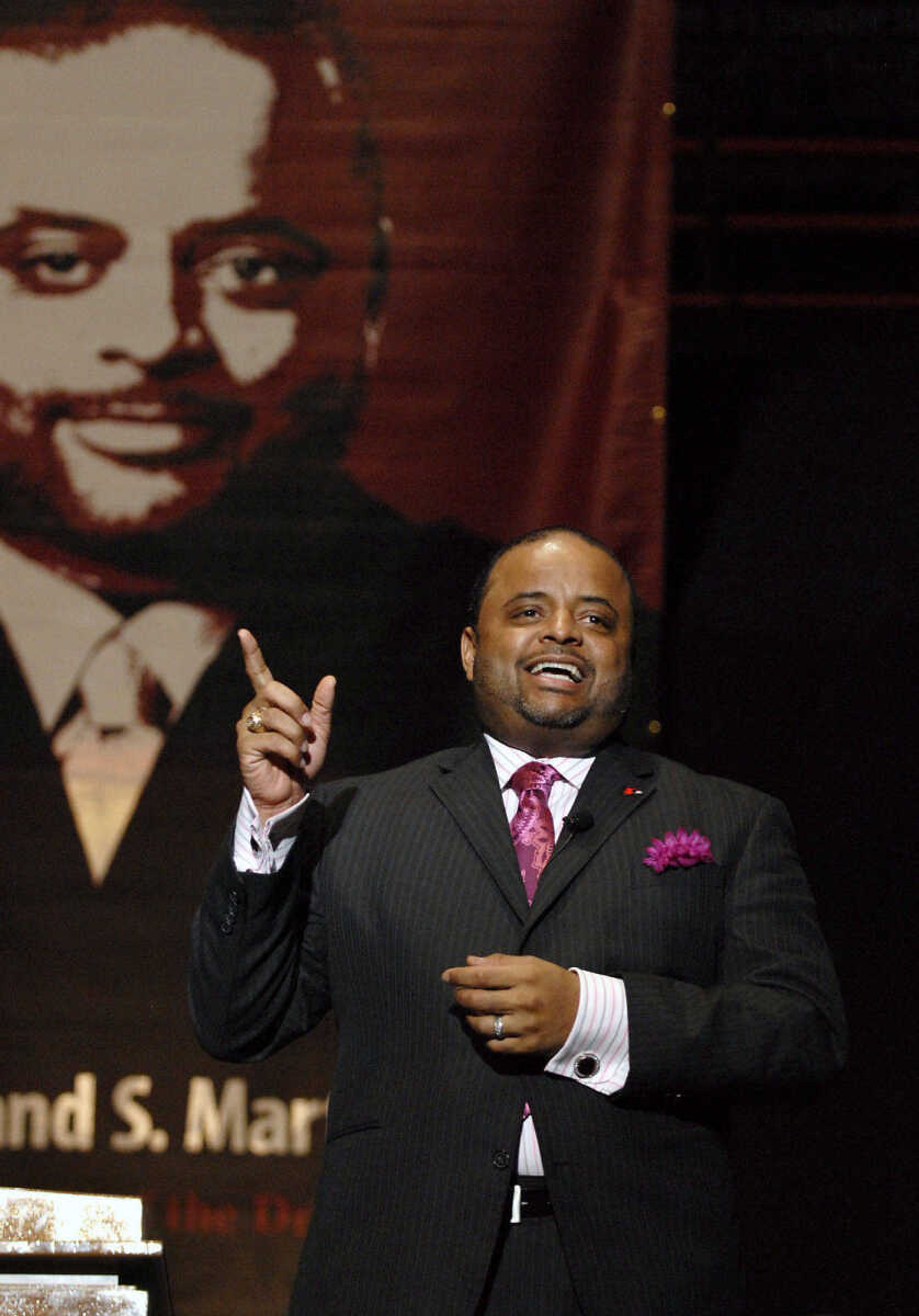 KRISTIN EBERTS ~ keberts@semissourian.com

Keynote speaker Roland Martin, an award-winning journalist and CNN contributor, addresses the crowd during the "Living the Spirit of the Dream" 2011 Dr. Martin Luther King, Jr. Celebration Dinner at the Show Me Center on Wednesday, Jan. 19.