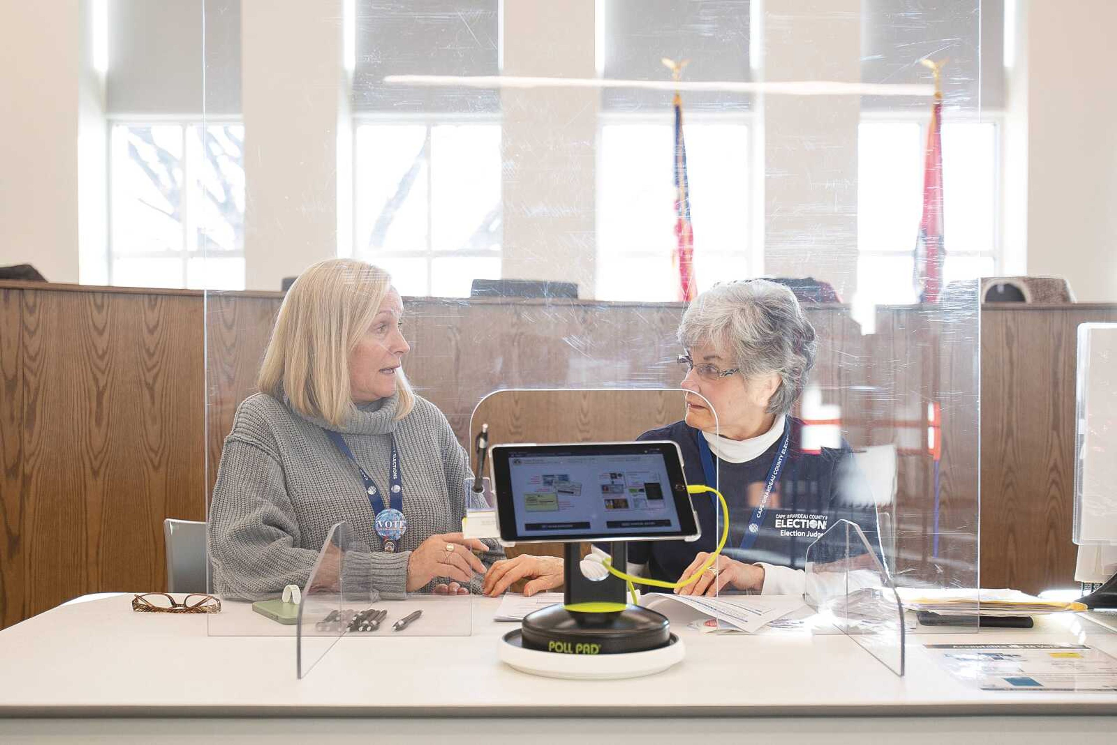 Election judges Cathy Bruit and Belinda Mueller await voters at precinct 2A in the Cape Girardeau City Hall on  Tuesday, Feb. 8, 2022. Photo by Aaron Eisenhauer