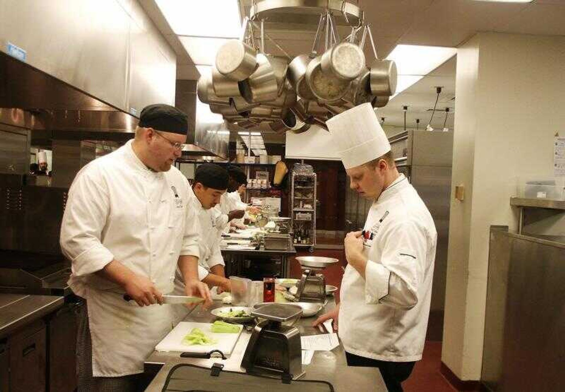 Joseph Dufek, left, got his start as a dishwasher at Bella Italia in downtown Cape Girardeau.