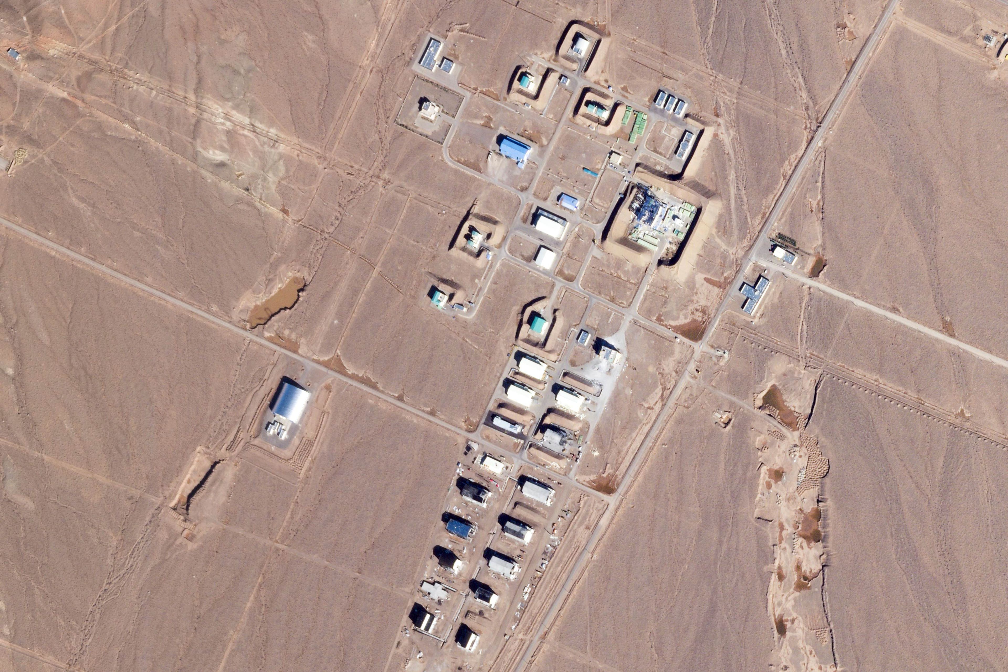 This satellite photo from Planet Labs PBC shows a damaged buildings at the Revolutionary Guard's Shahroud Space Center in Semnan province, Iran, Tuesday Oct. 29, 2024. Israel's attack on Iran likely damaged a base run by the paramilitary Revolutionary Guard that builds ballistic missiles and launches rockets as part of its own space program, satellite images analyzed by The Associated Press on Tuesday showed. (Planet Labs PBC via AP)