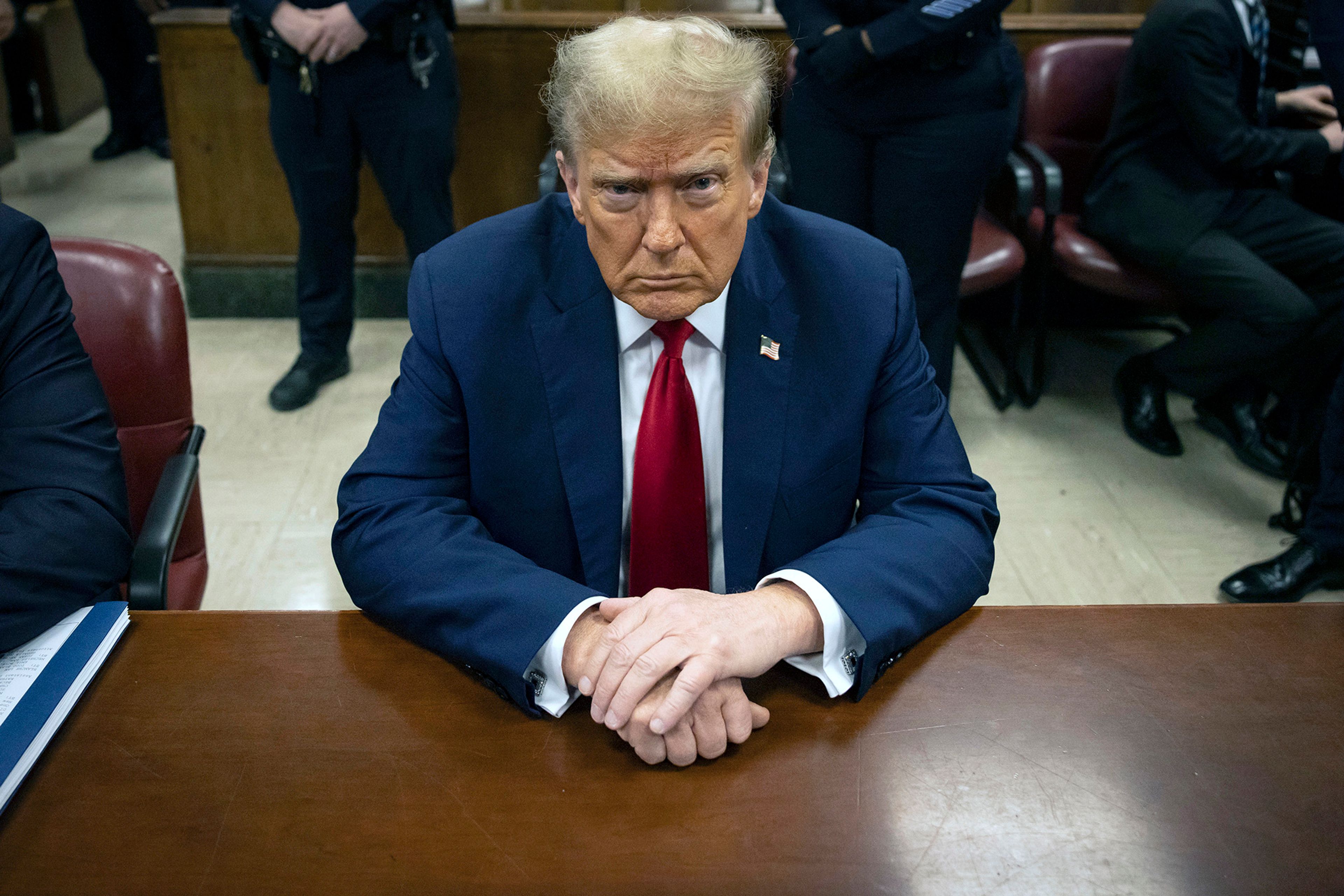 Former President Donald Trump waits for the start of proceedings in Manhattan criminal court, Tuesday, April 23, 2024, in New York. Before testimony resumes Tuesday, the judge will hold a hearing on prosecutors' request to sanction and fine Trump over social media posts they say violate a gag order prohibiting him from attacking key witnesses. 