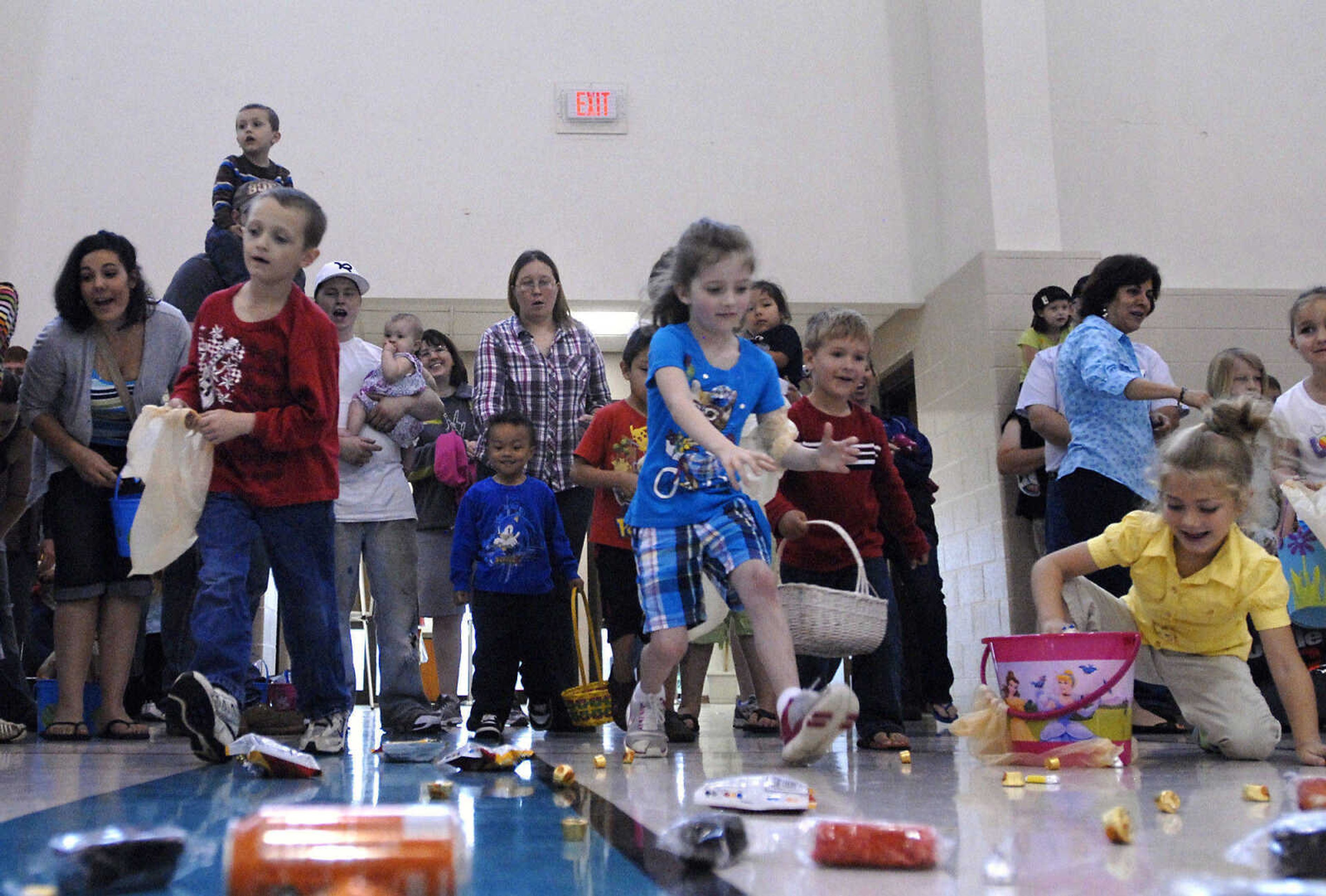 KRISTIN EBERTS ~ keberts@semissourian.com

Kids take off from the starting line during the Schnucks Pepsi Easter egg hunt at the Osage Center on Saturday, April 23, 2011, in Cape Girardeau. Kids ages 2-7 turned out to collect an array of soda, chips, cookies and candy during the hunt.