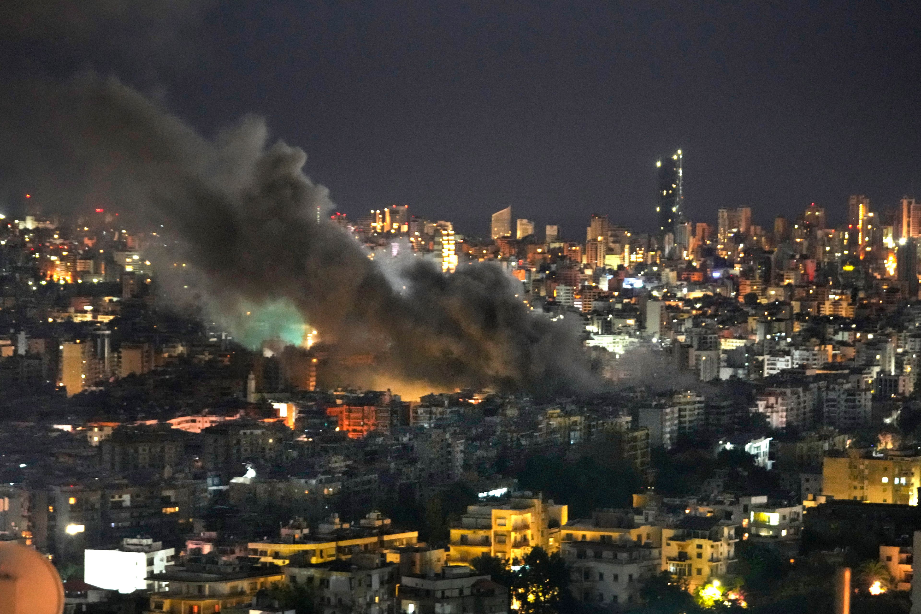 Smoke rises from Israeli airstrikes on Dahiyeh, in the southern suburb of Beirut, Lebanon, early Sunday, Oct. 20, 2024. (AP Photo/Hussein Malla)