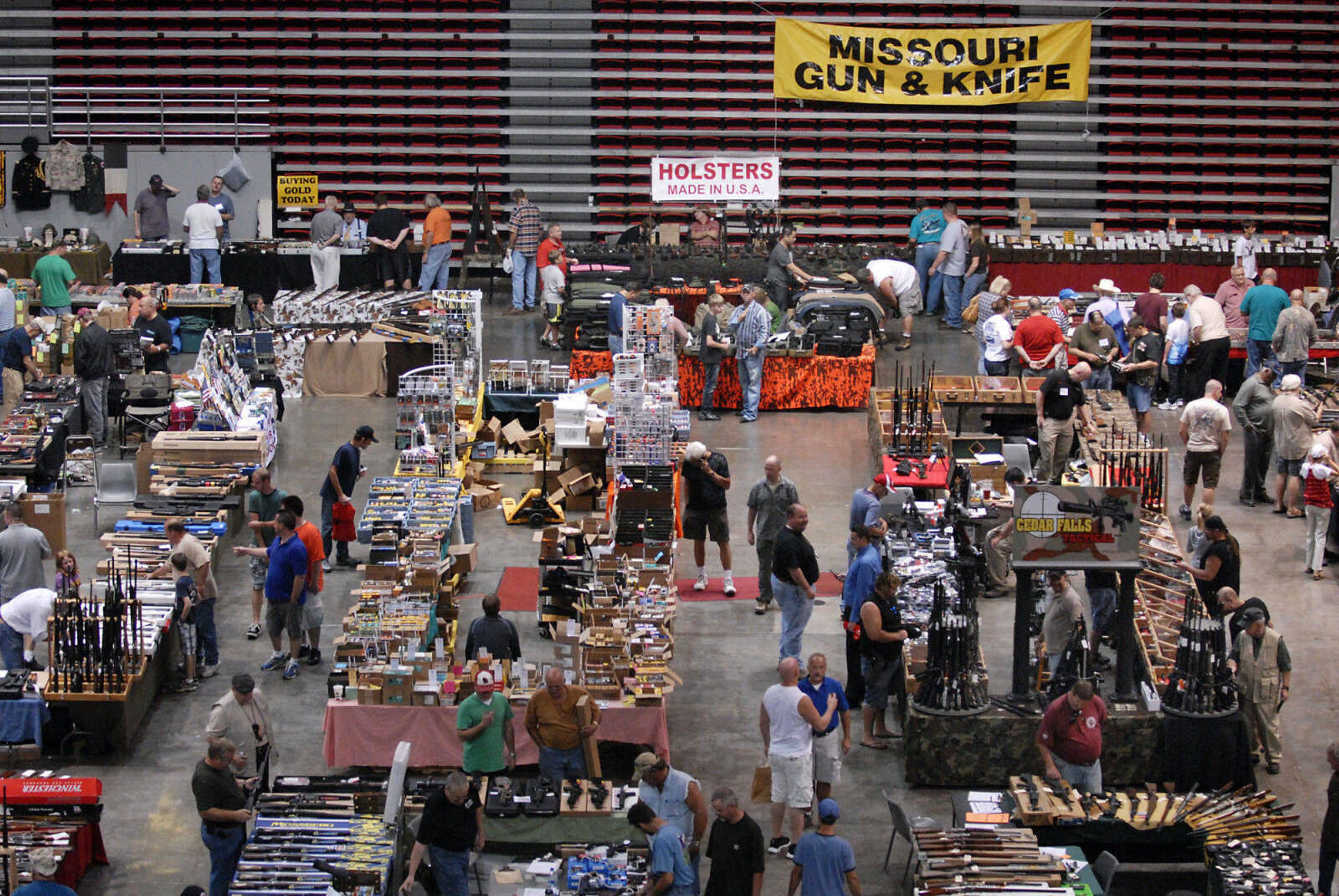 KRISTIN EBERTS ~ keberts@semissourian.com

Vendors line the floor during the Missouri Gun and Knife Show on Saturday, Sept. 25, 2010, at the Show Me Center in Cape Girardeau.