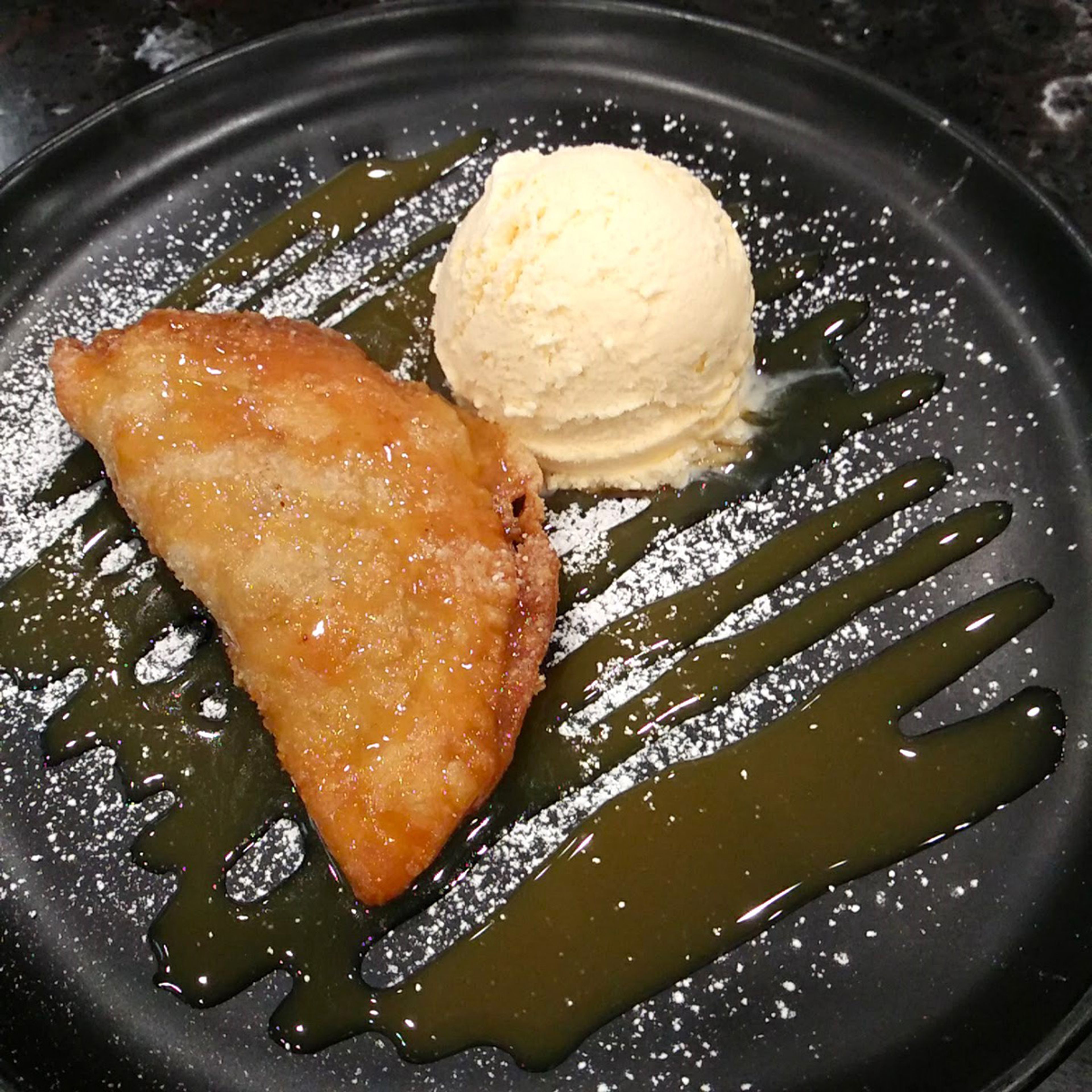 Southern Fried Apple Pie, covered in a caramel sauce that is the best thing to ever happen to apples.