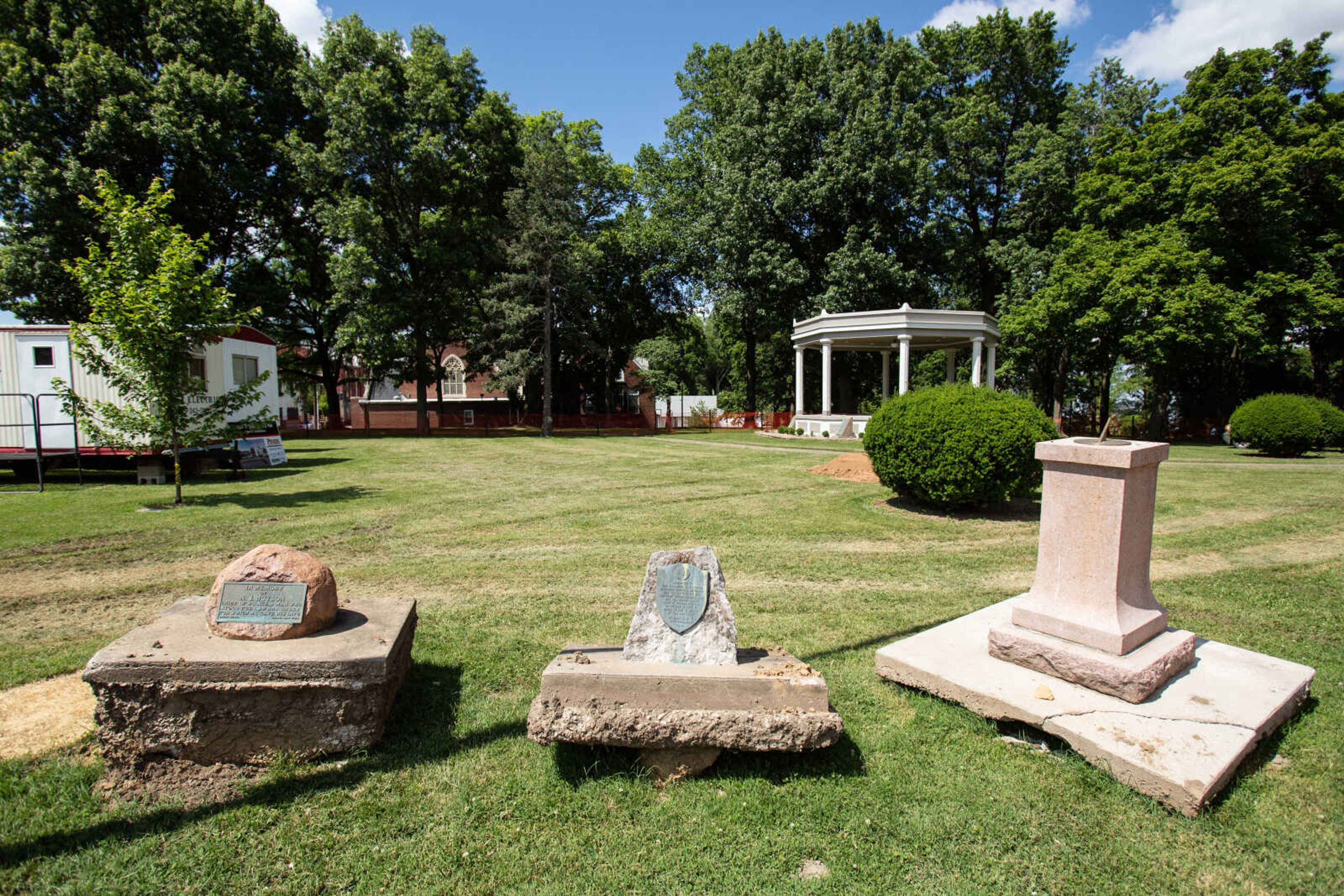 Several monuments and memorials sit uprooted on the courthouse lawn, safely out of the way of heavy machinery as crews begin renovations on the Cape Girardeau Common Pleas Courthouse.