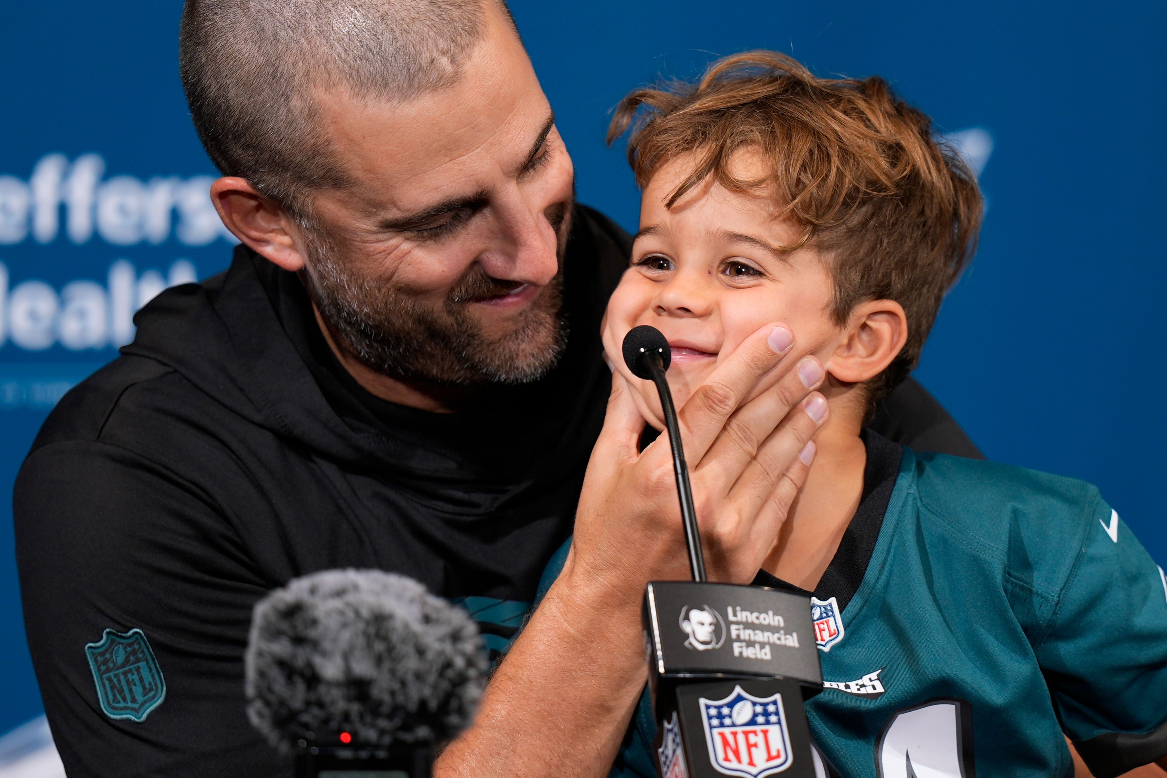 Philadelphia Eagles head coach Nick Sirianni speaks during a news conference with son Miles after an NFL football game against the Cleveland Browns on Sunday, Oct. 13, 2024, in Philadelphia. (AP Photo/Chris Szagola)