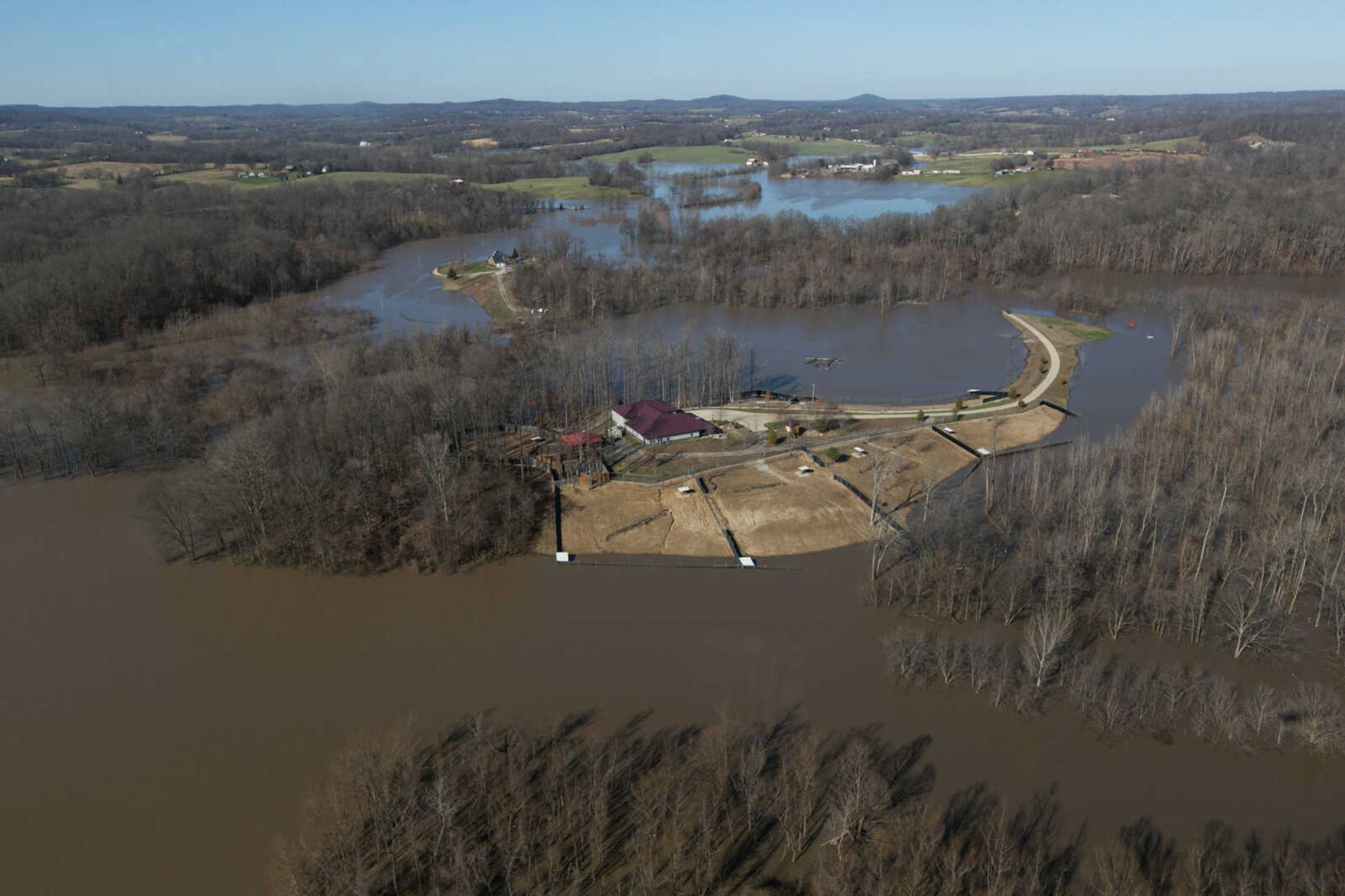 GLENN LANDBERG ~ glandberg@semissourian.com

The swollen Mississippi River is seen a portion of Highway 177 and the surrounding areas in Cape Girardeau, Saturday, Jan. 2, 2016.