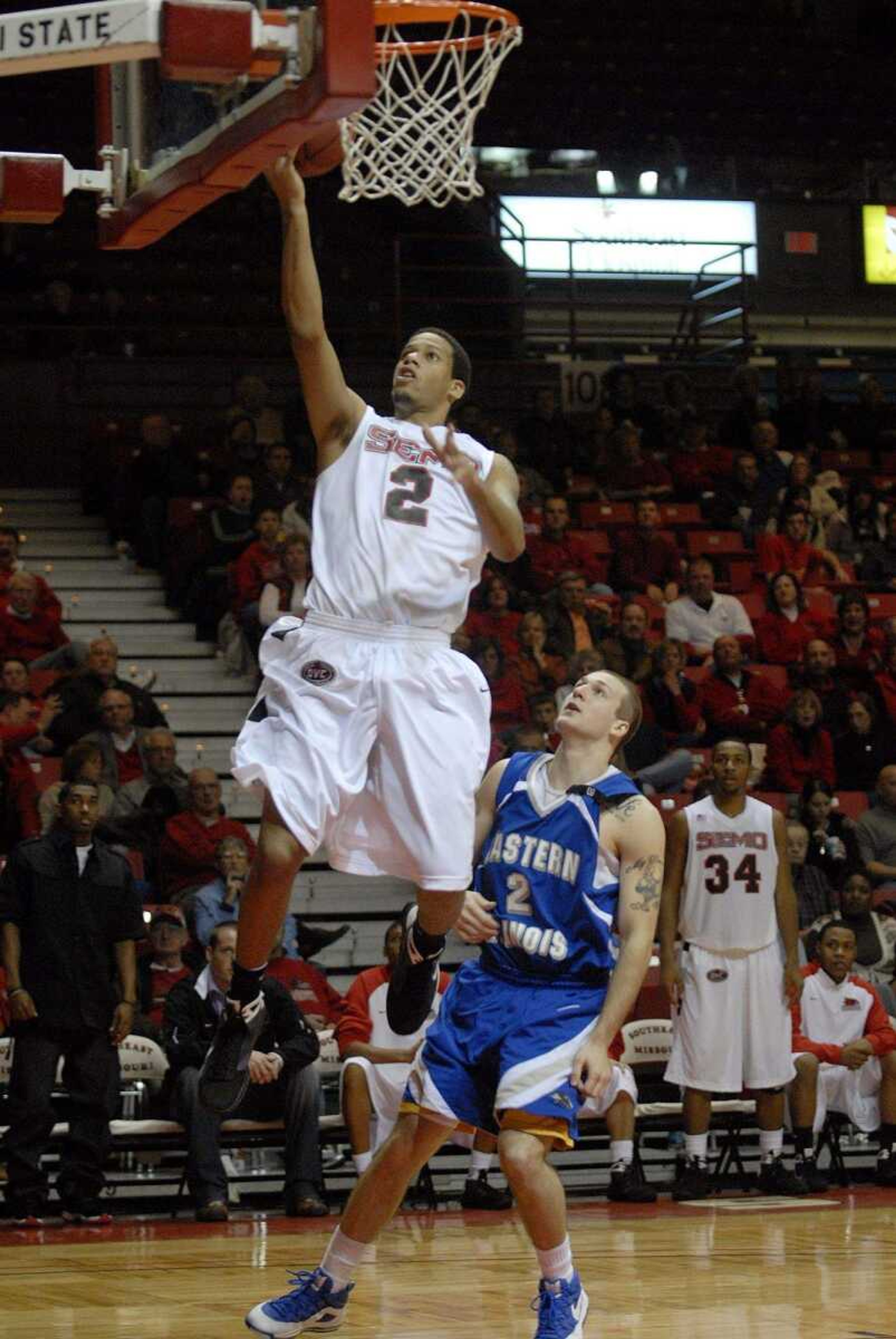 ELIZABETH DODD ~ edodd@semissourian.com
Southeast Missouri's Jaycen Herring scores two points against Eastern Illinois' Tyler Laser in the second half Saturday night at the Show Me Center.