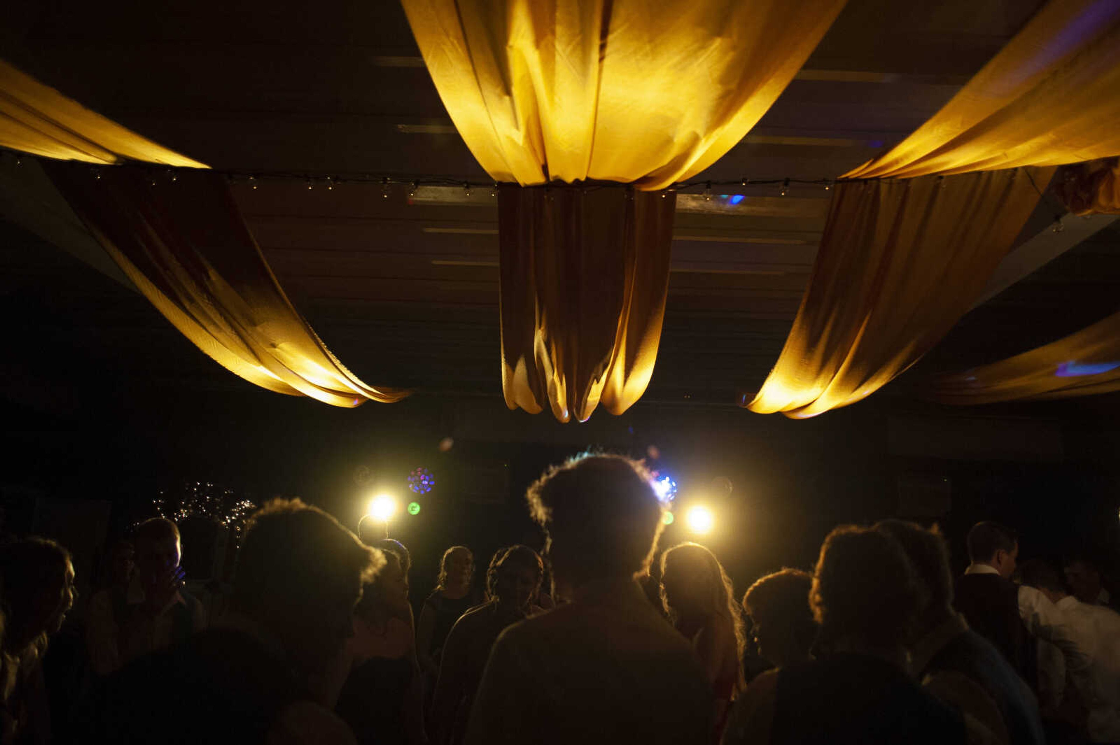 Prom guests dance during Leopold High School's "Masquerade at Midnight" prom Saturday, April 27, 2019, in Leopold.