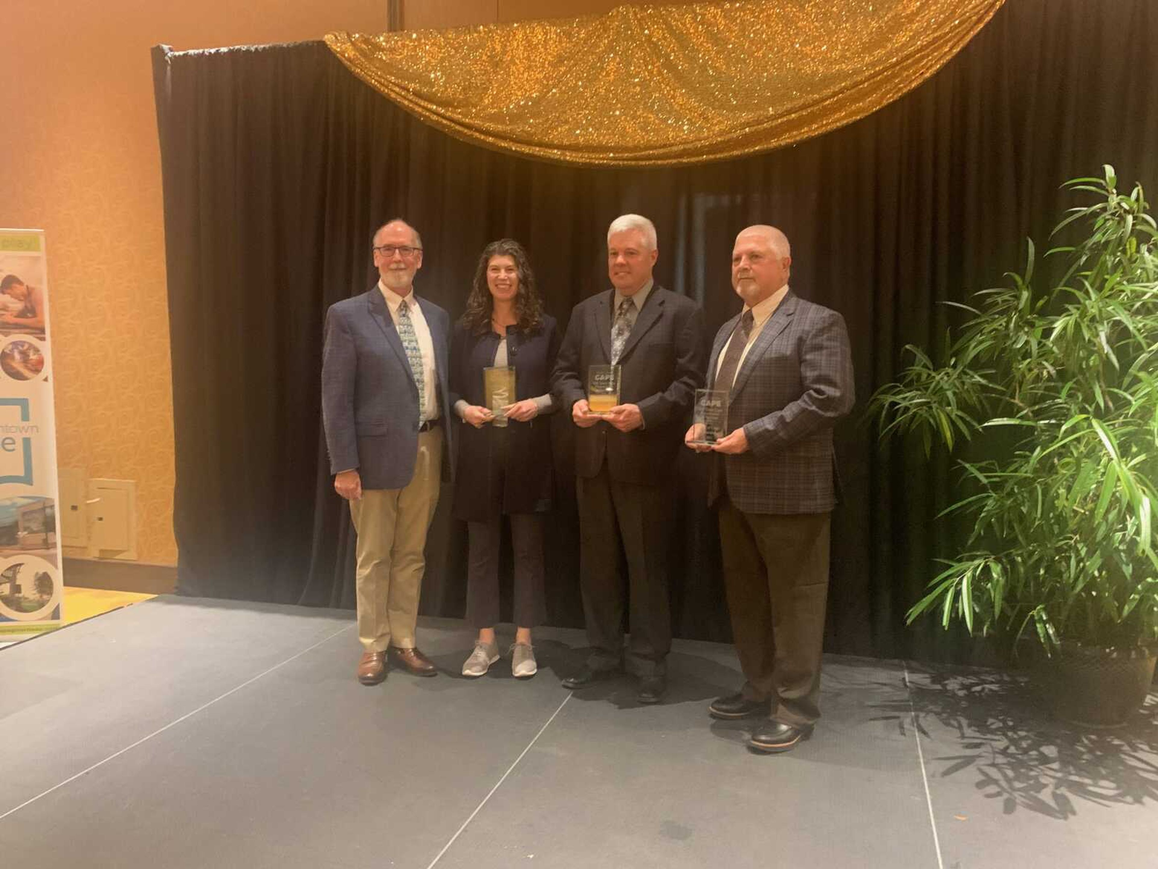 Bob Fox, Mayor of Cape Girardeau, Phil Penzel, CEO of Penzel Construction and Joy Coleman, member of the American Institute of Architects, holder their 'Preservation of Heritage' awards for their work on Cape's Common Pleas Courthouse. Fox said the historic courthouse is a "symbol of our city and symbol of our community."&nbsp;