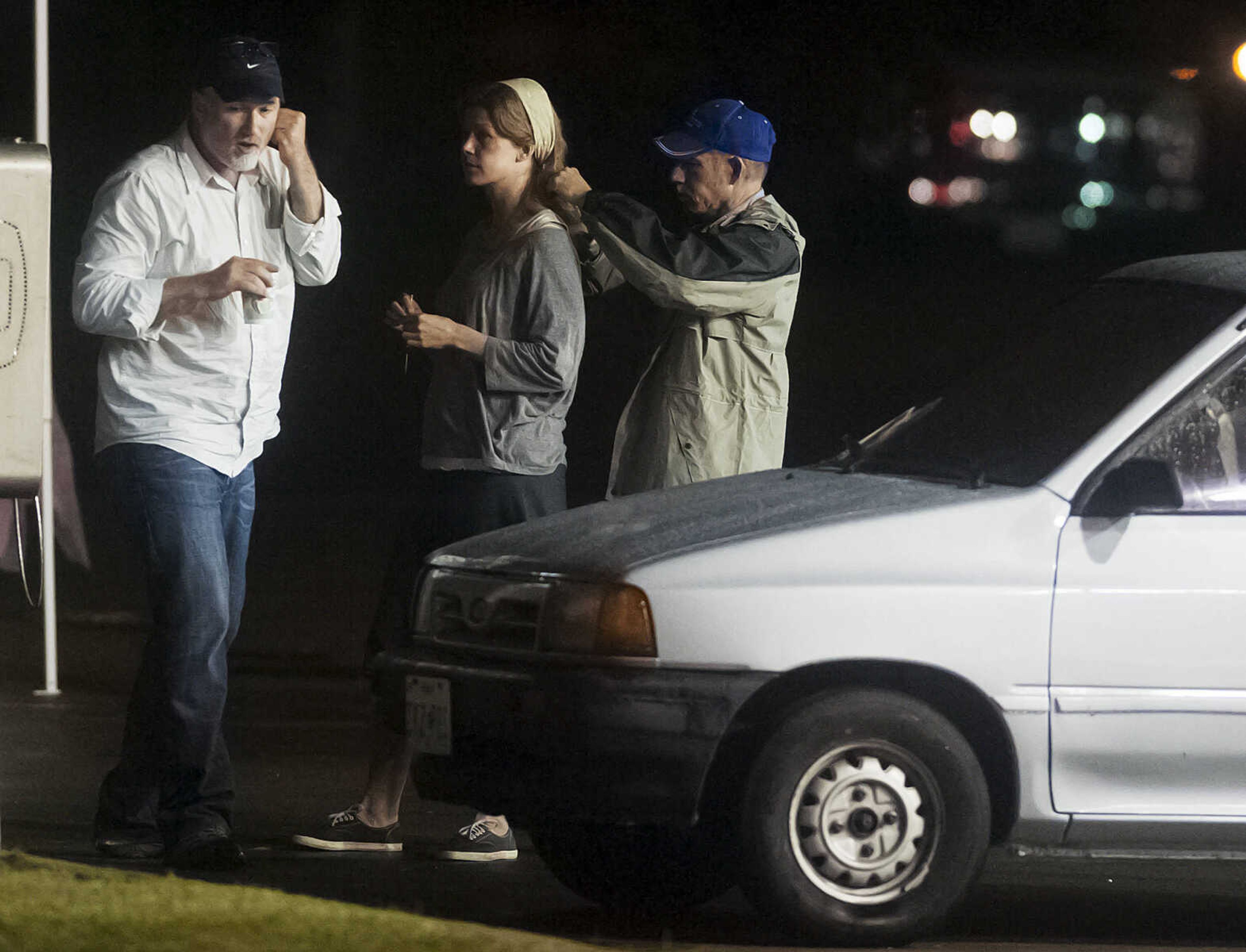 ADAM VOGLER ~ avogler@semissourian.com
A man believed to be director David Fincher and an actress believed to be Rosamund Pike talk before shooting a scene on the set of "Gone Girl," Friday, Sept. 20, at the Rhodes 101at 546 S. Sprigg St. in Cape Girardeau. Pike plays Amy Dunne in the film which is based on a novel of the same name by Gillian Flynn.