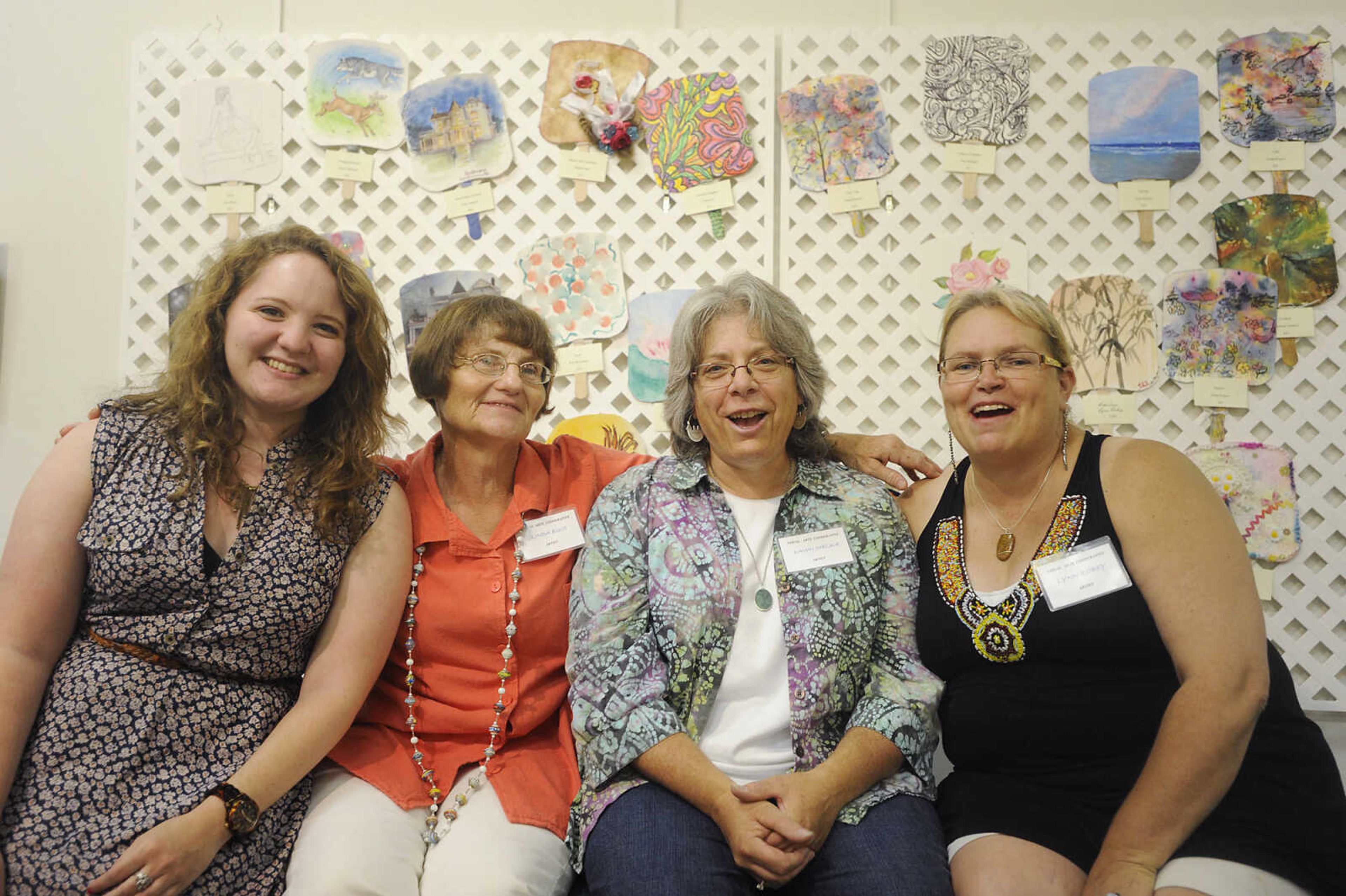 Mamie Cox, Linda Buis, Dawn Melka and Lynn Robey at the Cape Arts Council, 32 N. Main Street, during First Friday. The first Friday of each month galleries in Downtown Cape Girardeau hold openings from 5 p.m to 9 p.m. with food, drink and the opportunity to talk with the artists about their work.