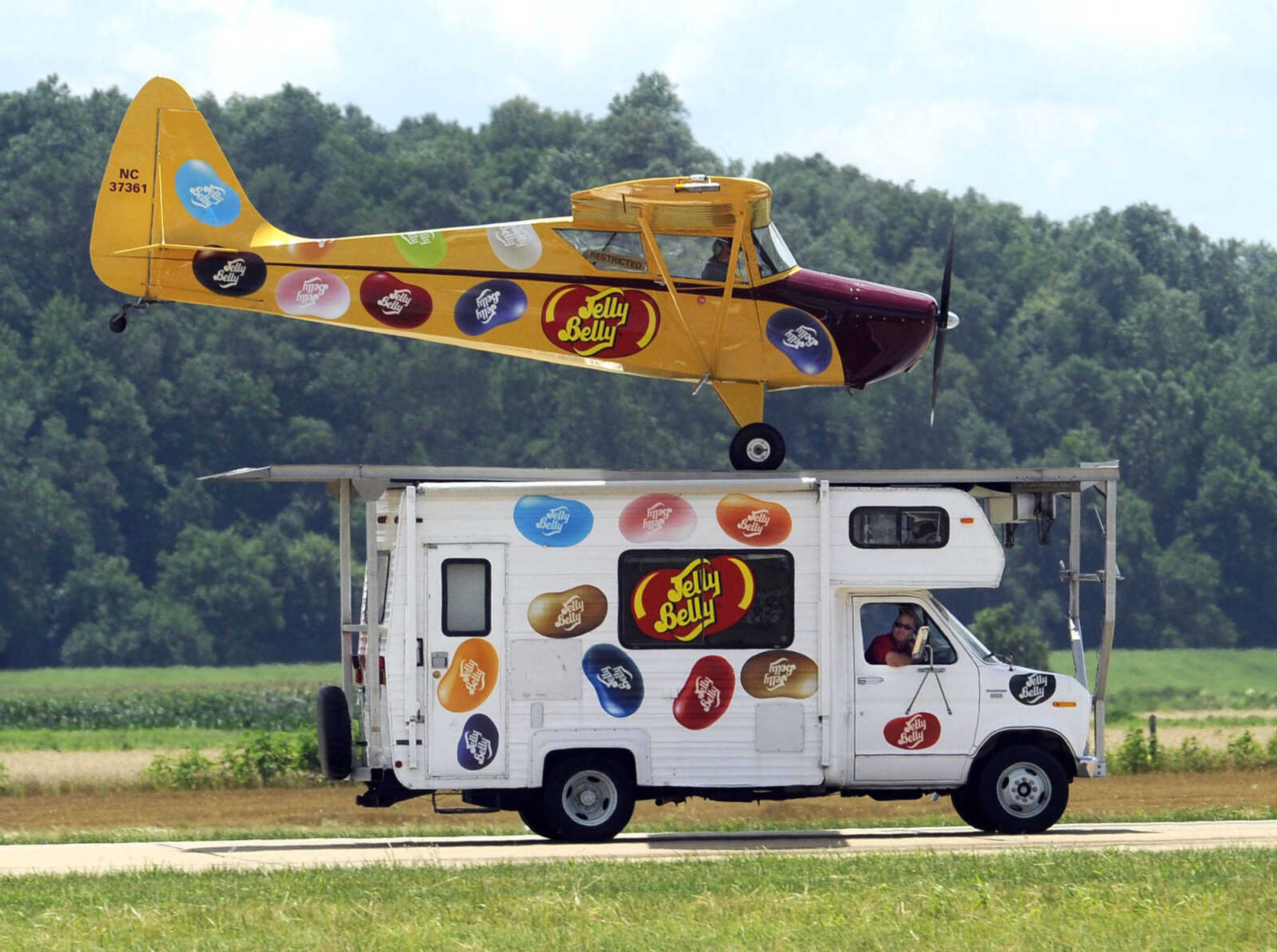 Kent Pietsch lands his Jelly Belly Interstate Cadet on a moving RV at the Cape Girardeau Regional Air Festival, June 29, 2013. (Fred Lynch)