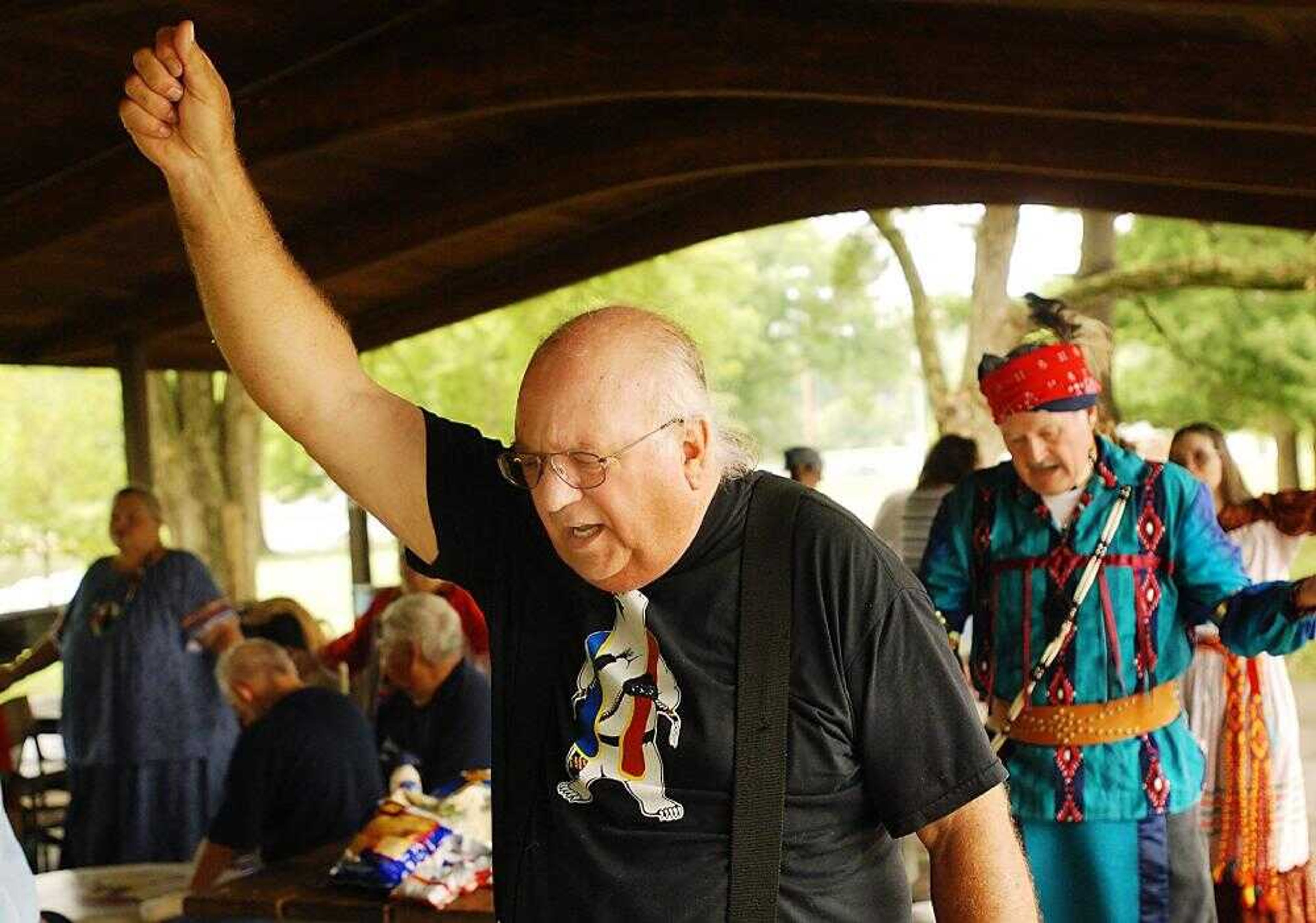 Michael Ballard of Topeka, Kan., led a going-to-water dance at the Northern Cherokee Nation reunion at Capaha Park on Saturday. The group gathered to shared in their heritage with such things as music, dancing and food. (Aaron Eisenhauer)