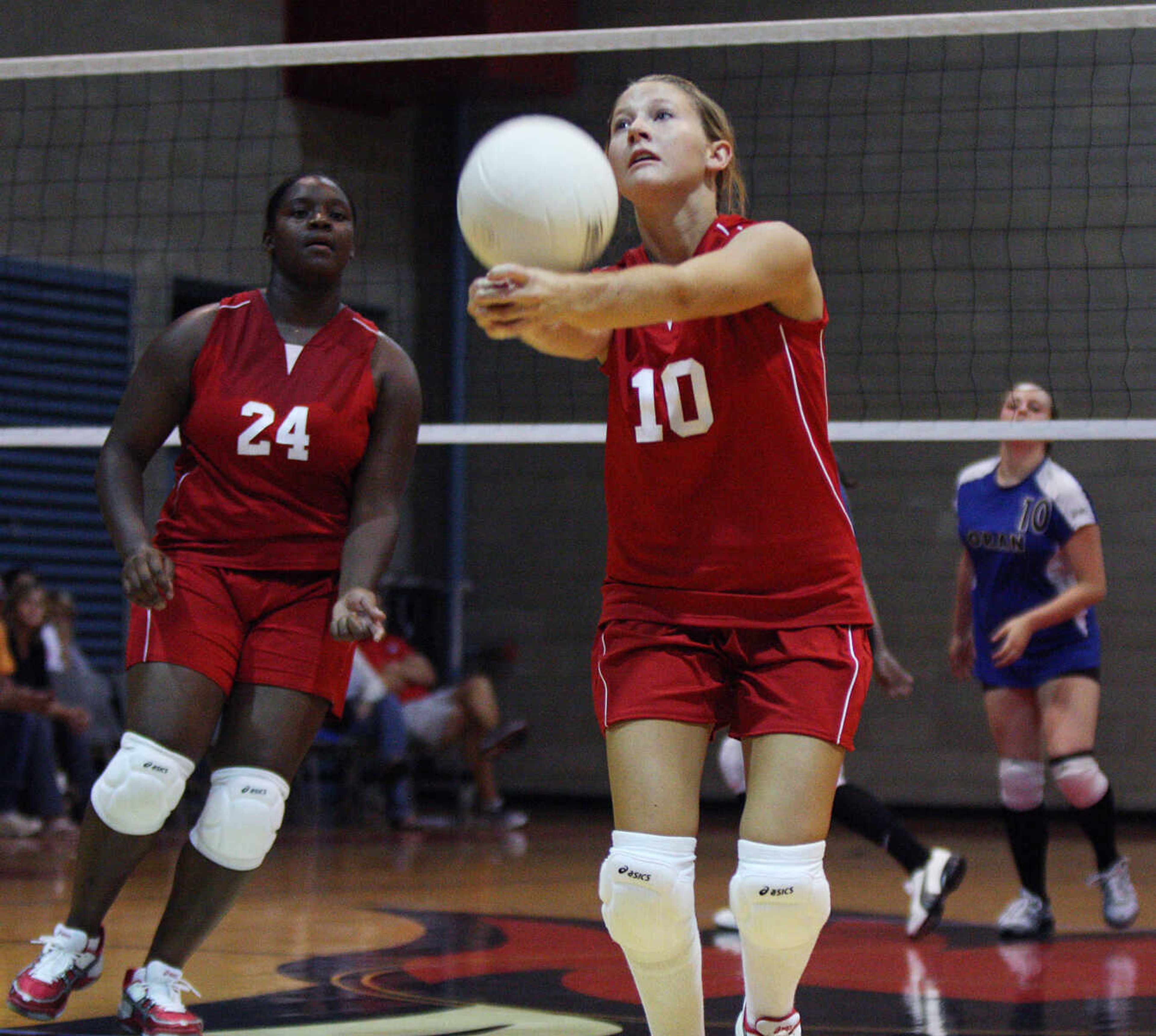 Caruthersville's Kelsey Faulkner attempts to keep the ball in play.