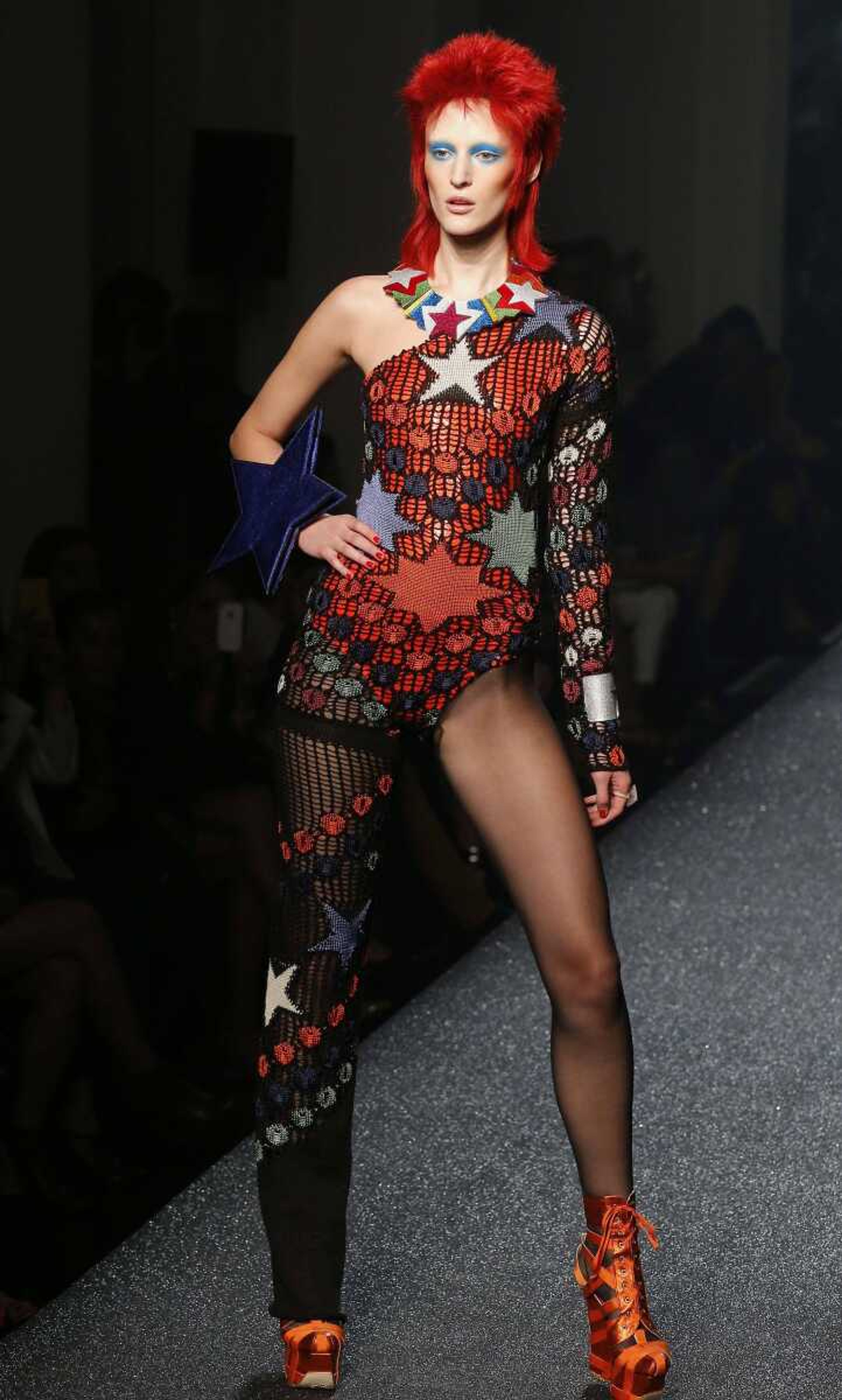 Model Hannelore Knuts wears a David Bowie-inspired creation by French fashion designer Jean-Paul Gaultier during a Sept. 29, 2012, presentation in Paris.