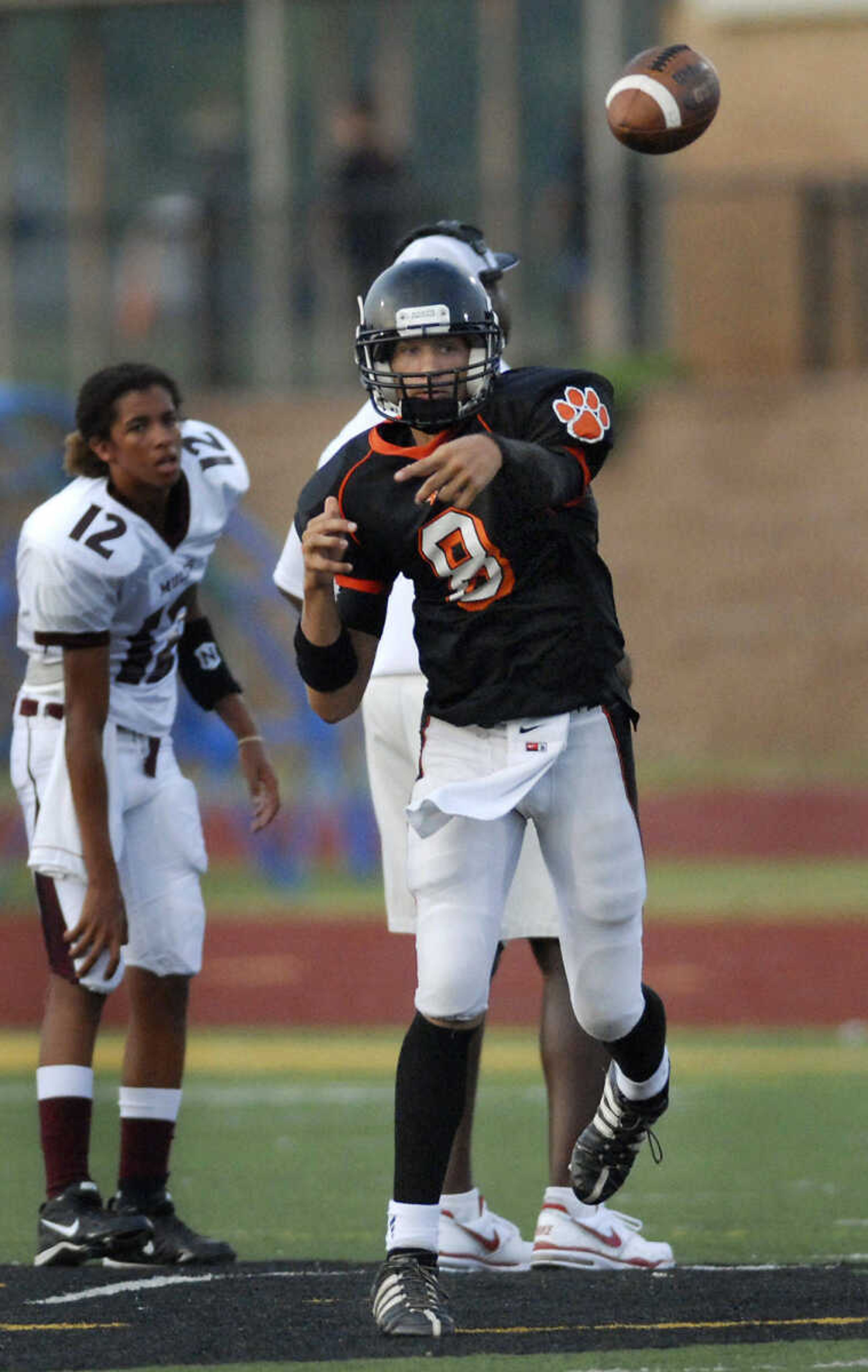 KRISTIN EBERTS ~ keberts@semissourian.com

Cape Central quarterback Christian Cavaness makes a pass during a jamboree game against Cardinal Ritter College Prep on Friday, August 20, 2010, at Farmington High School.