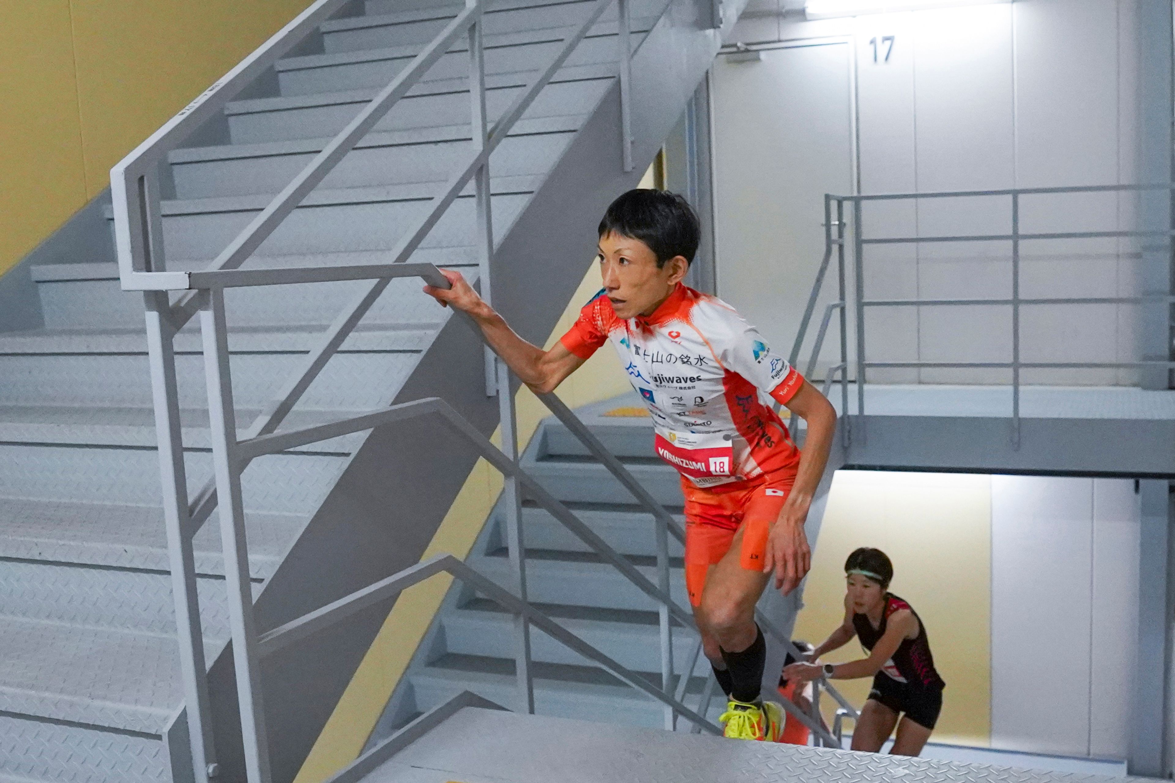 In this photo provided by ISF/Meeting, runner Yuri Yoshizumi competes during a race of Stairclimbing World Championships in Osaka, western Japan, on Nov. 19, 2023. (ISF/MEETING via AP)